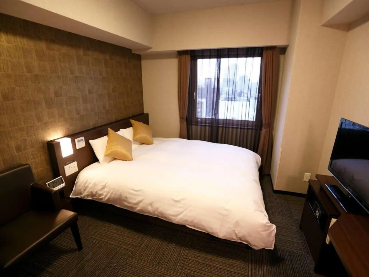 Bed in Dormy Inn Premium Namba Natural Hot Spring