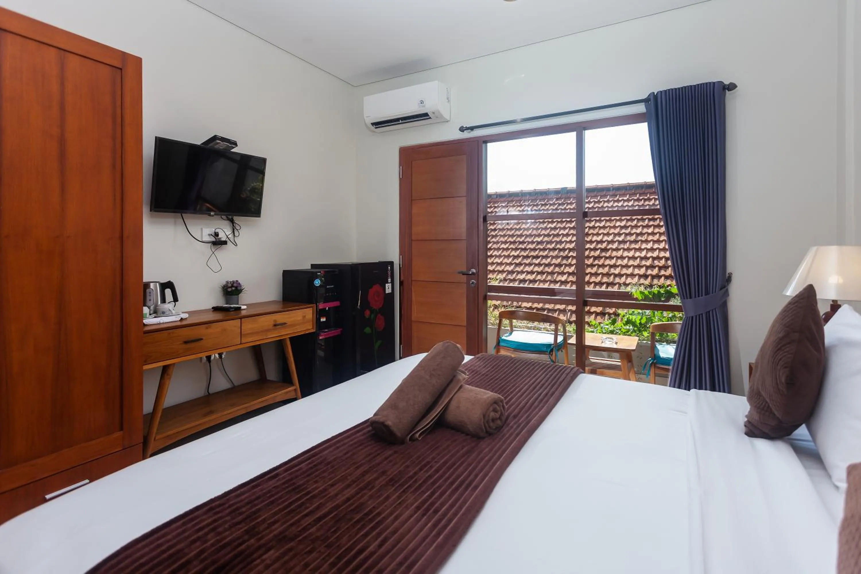 Bed in Naksa Homestay Sanur