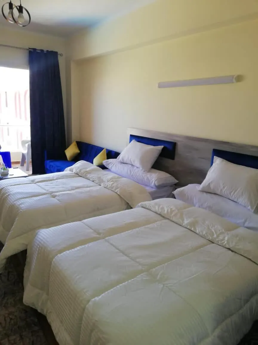 Bed in florenza khamsin studio in hurghada pool view