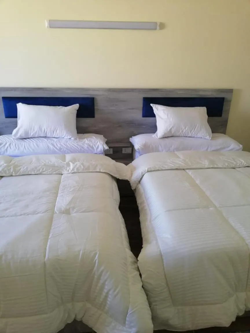 Bed in florenza khamsin studio in hurghada pool view