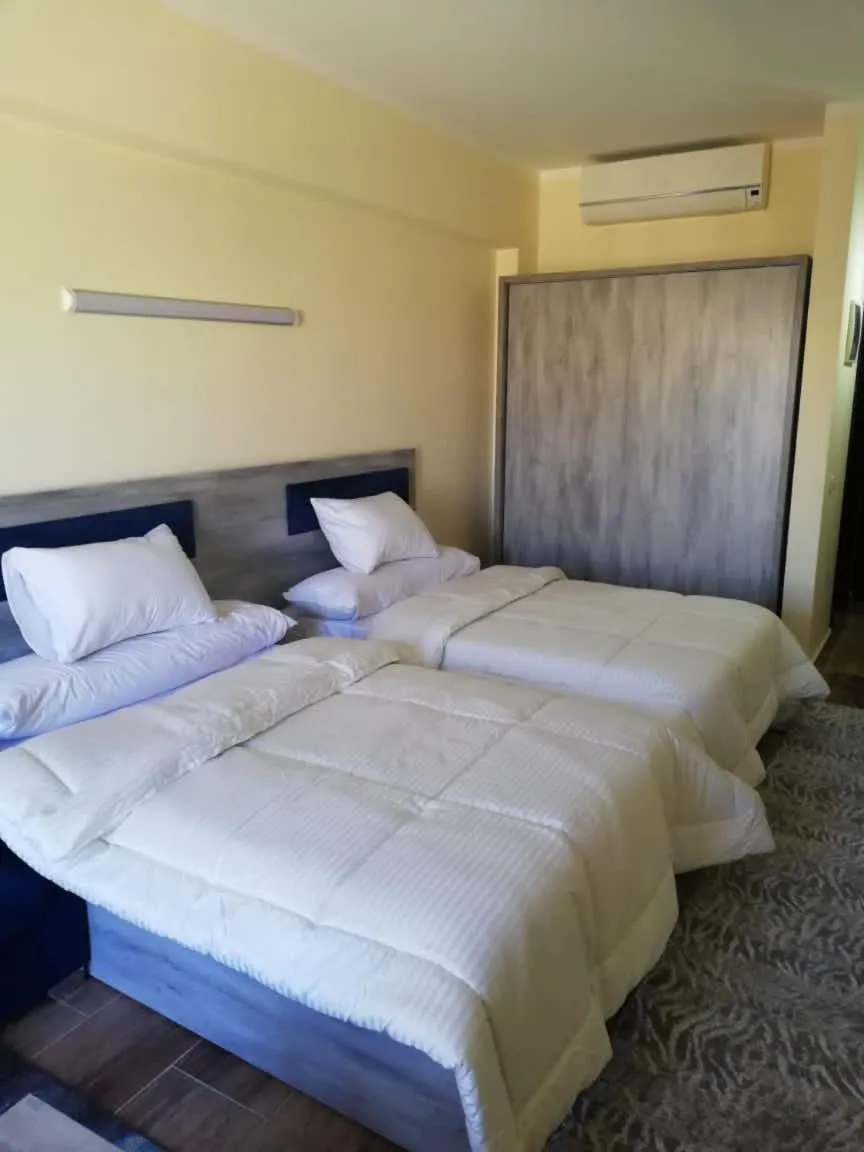 Bed in florenza khamsin studio in hurghada pool view