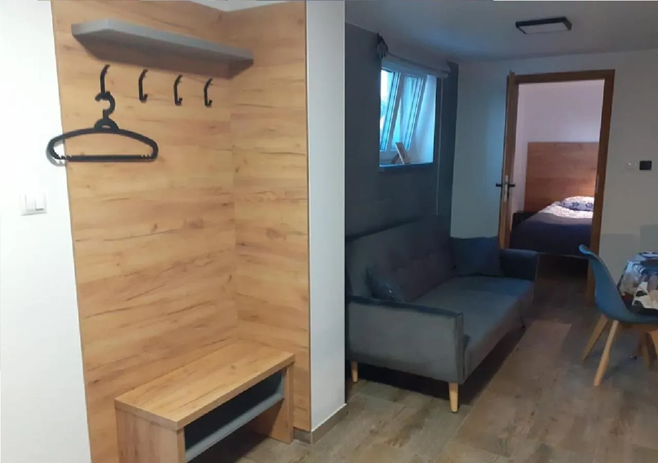 Seating area, Bed in Przystanek Tykocin - apartamenty gościnne