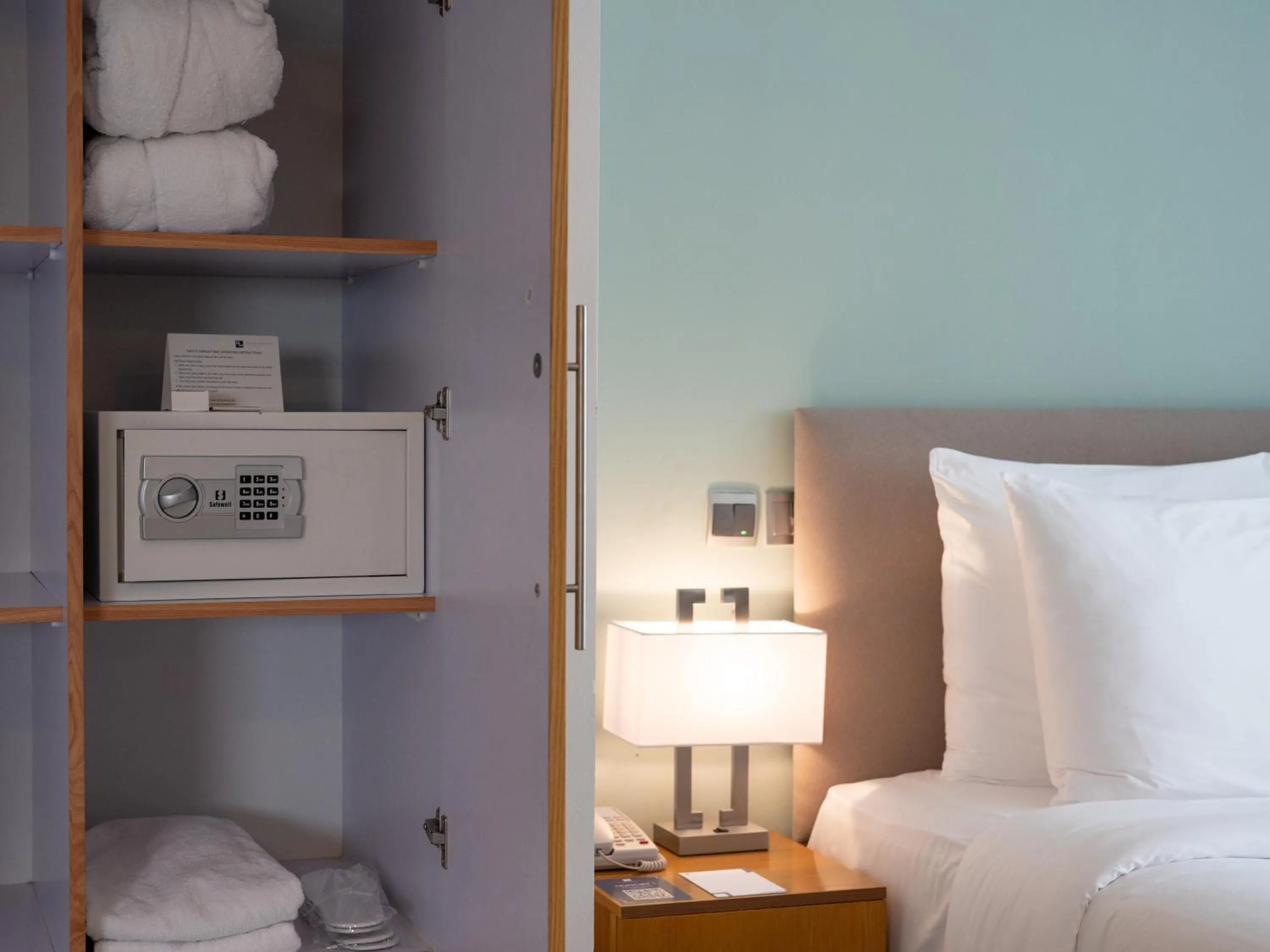 locker, Bed in Grand Heights Dubai Hotel Apartments