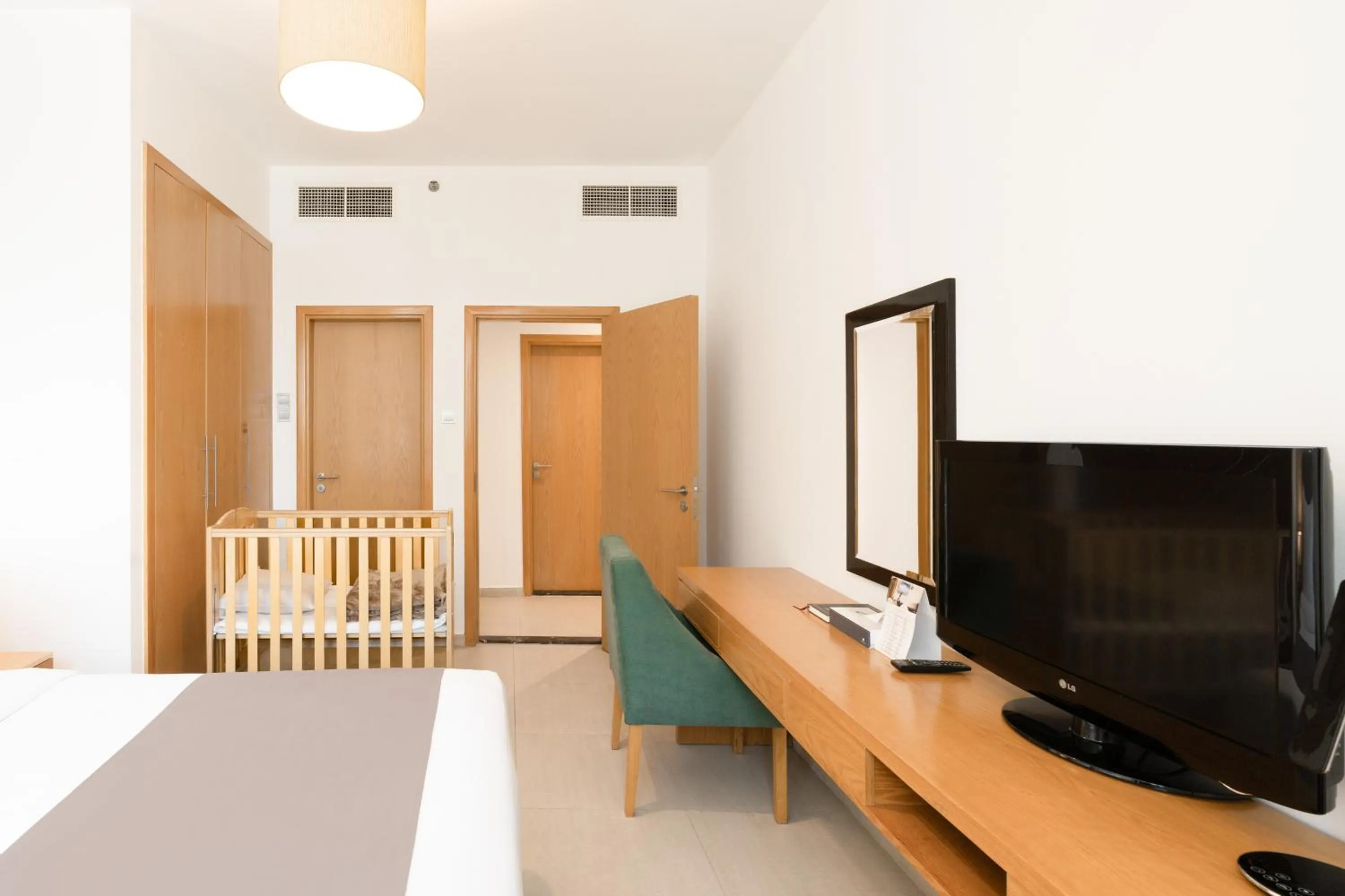 Bed in Grand Heights Dubai Hotel Apartments