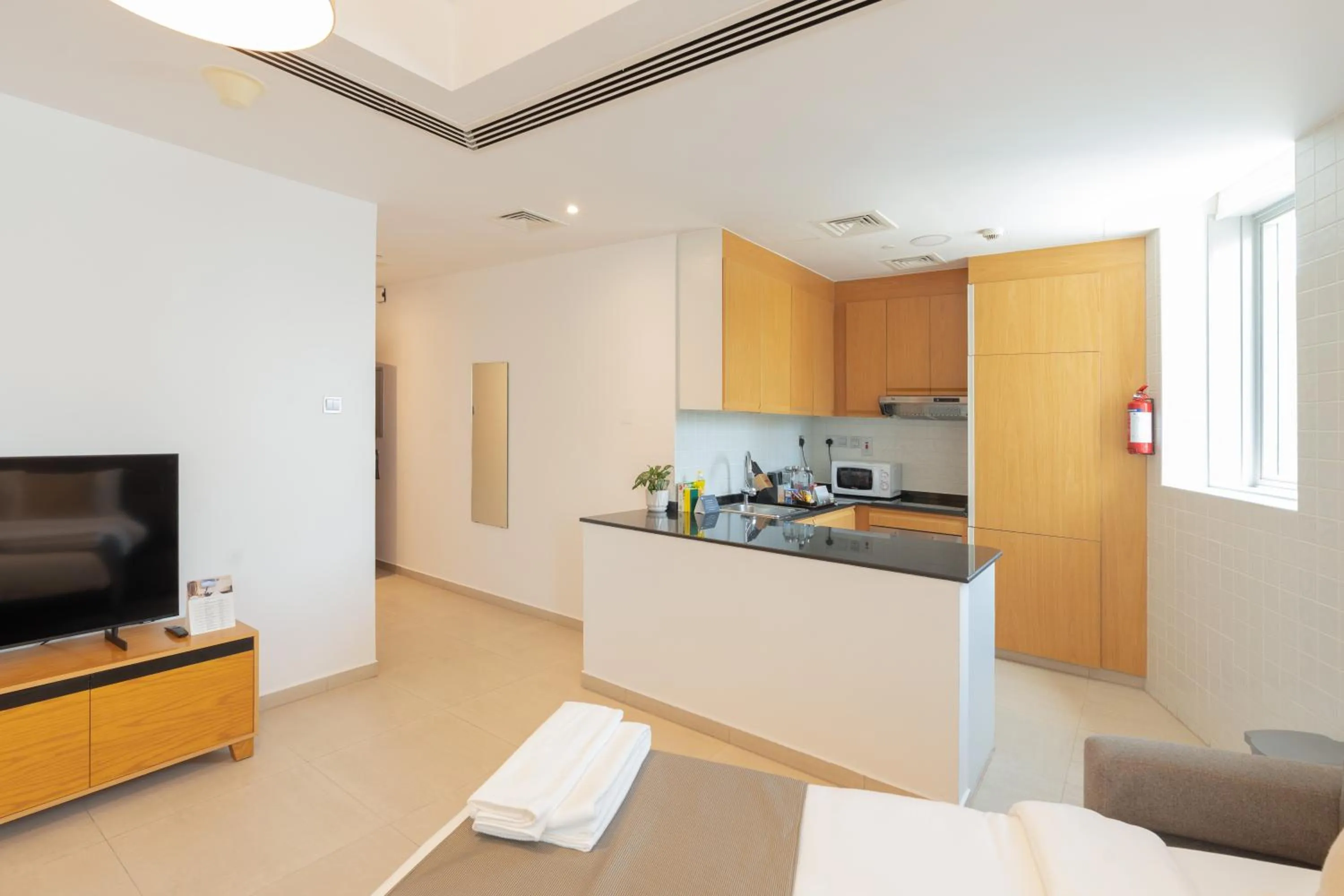 Kitchen or kitchenette in Grand Heights Dubai Hotel Apartments