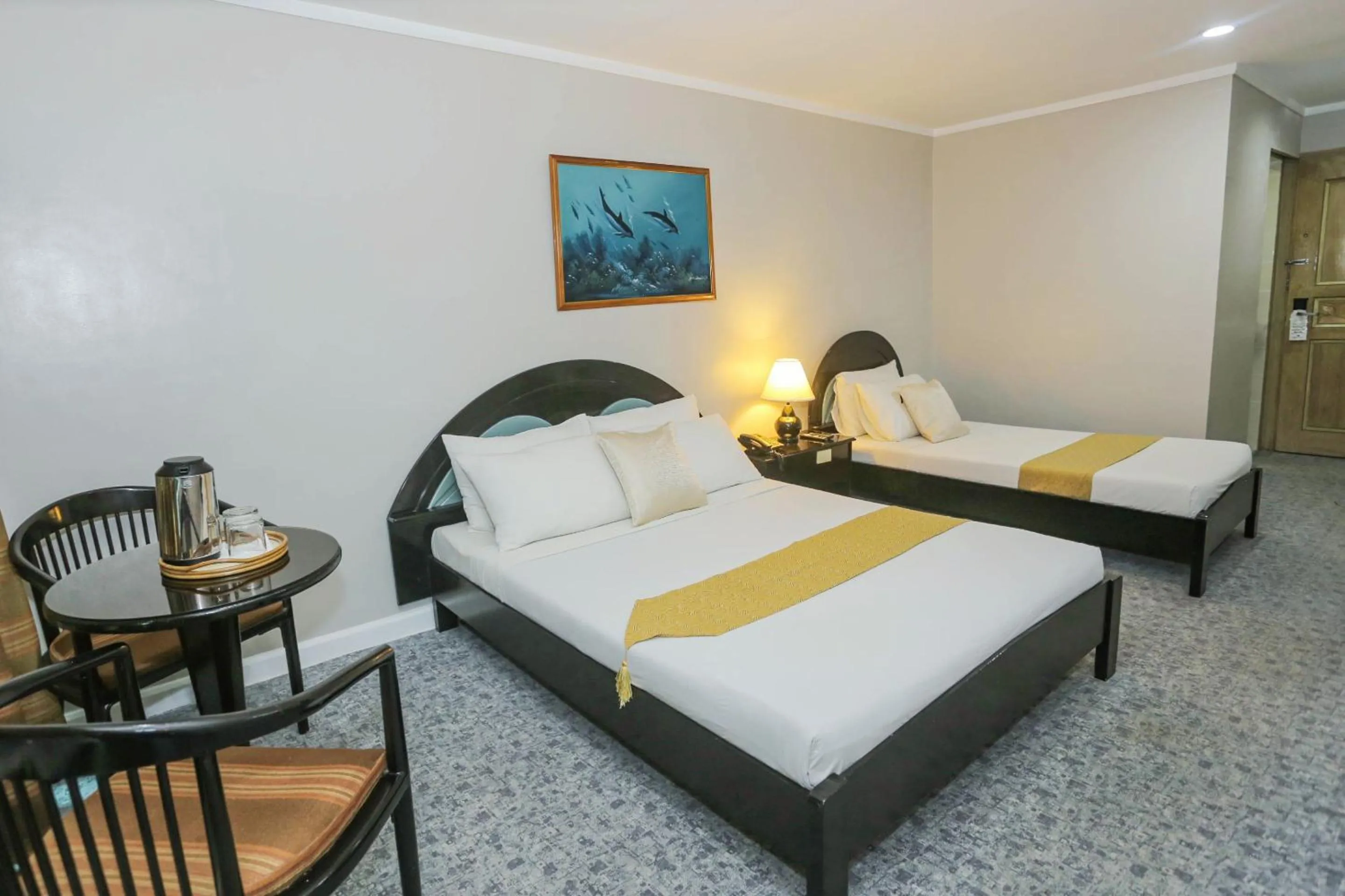 Bedroom, Bed in Holiday Plaza Hotel - Cebu