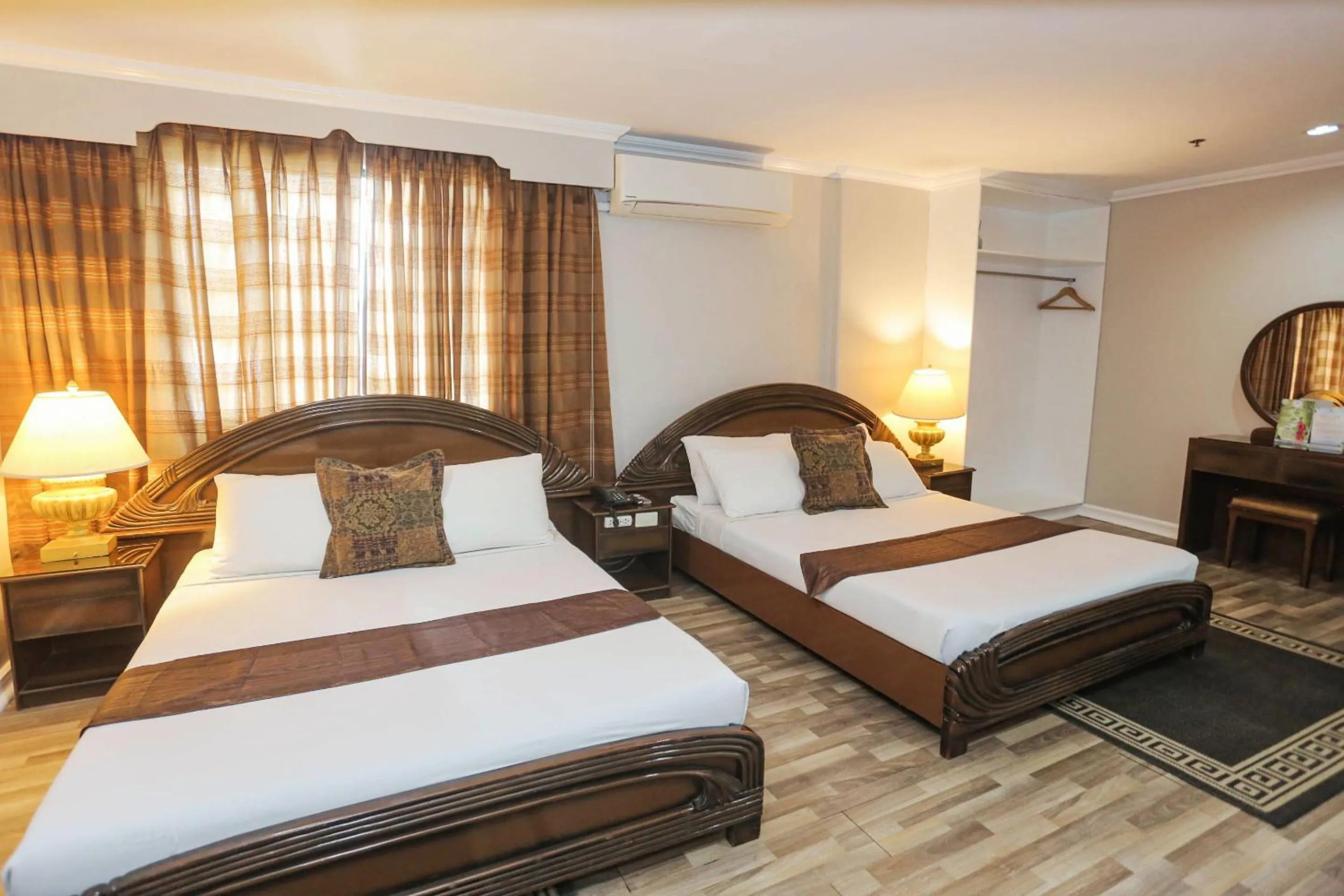 Bedroom, Bed in Holiday Plaza Hotel - Cebu
