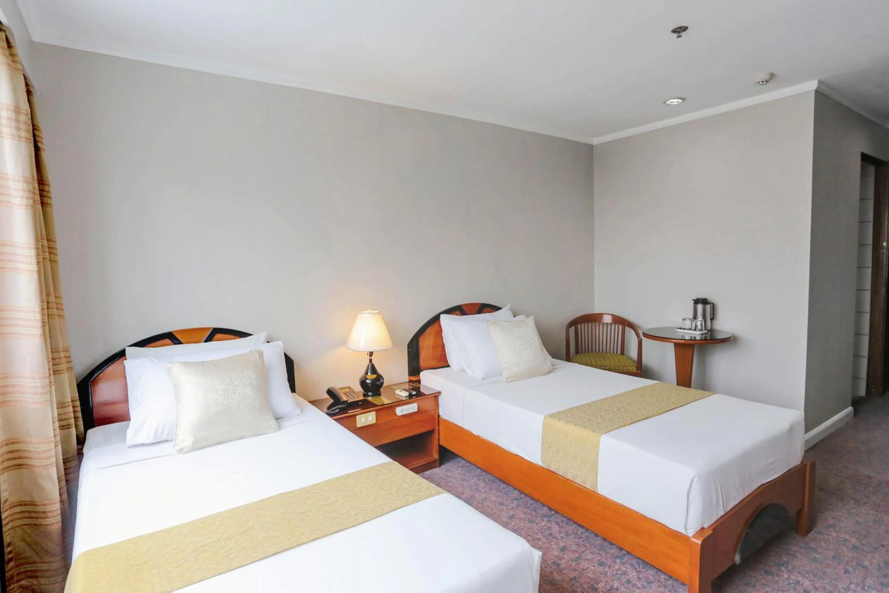 Bedroom, Bed in Holiday Plaza Hotel - Cebu