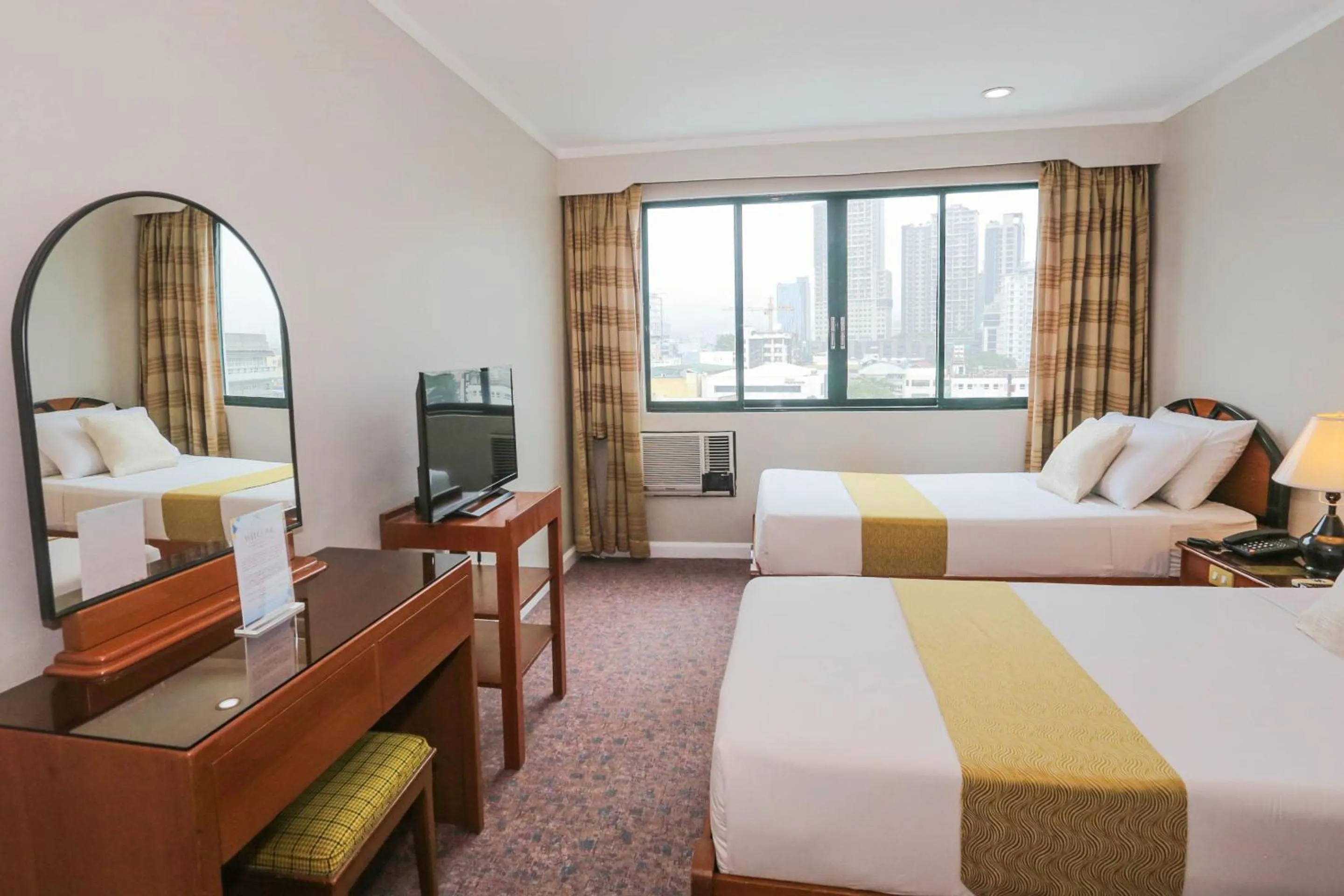 Bedroom, Bed in Holiday Plaza Hotel - Cebu