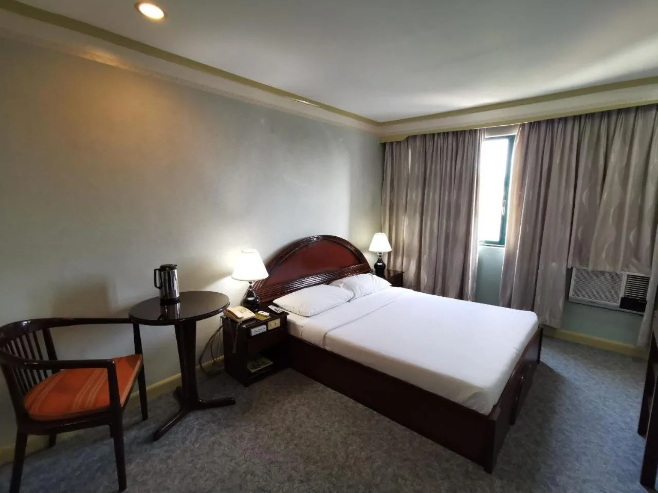 Bedroom, Bed in Holiday Plaza Hotel - Cebu