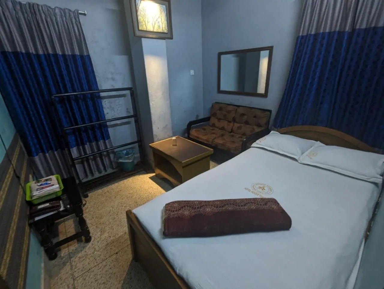 Bed in Hotel Hoque Tower International