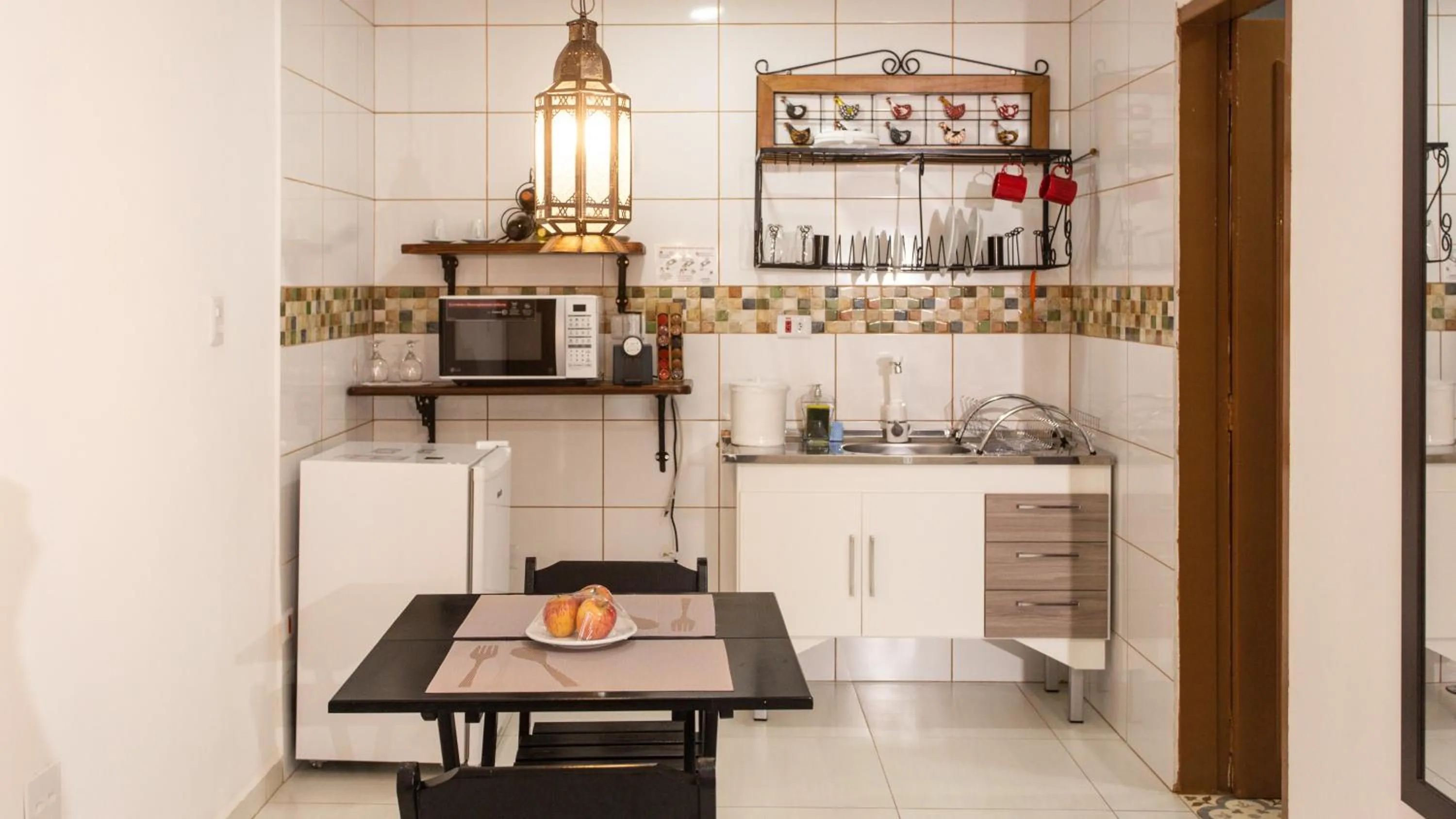 Kitchen or kitchenette in Hotel Chalet Monet - Granja Vianna