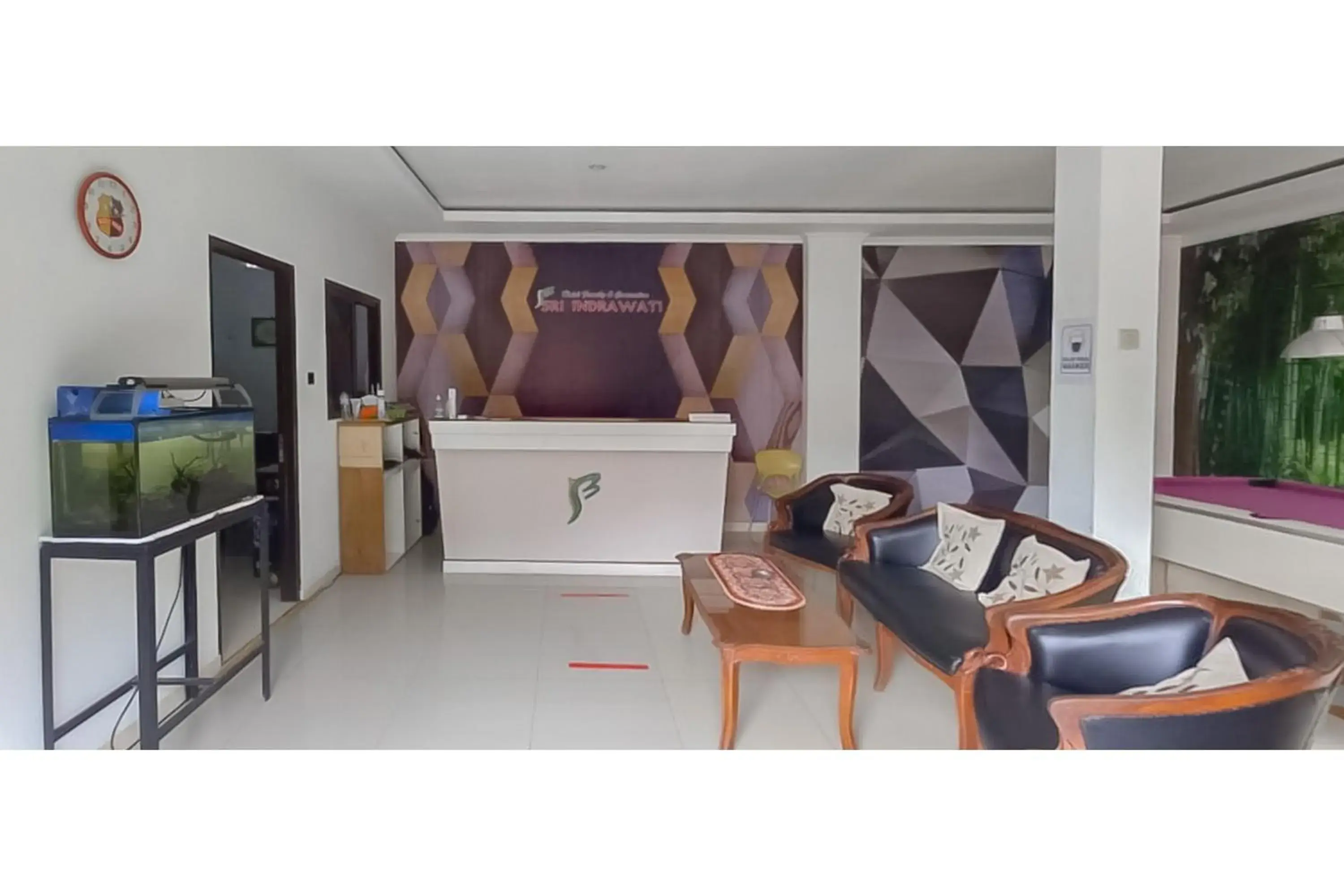 Lobby or reception in Hotel Sri Indrawati Puncak Mitra RedDoorz Lobby or reception in Hotel Sri Indrawati Puncak Mitra RedDoorz