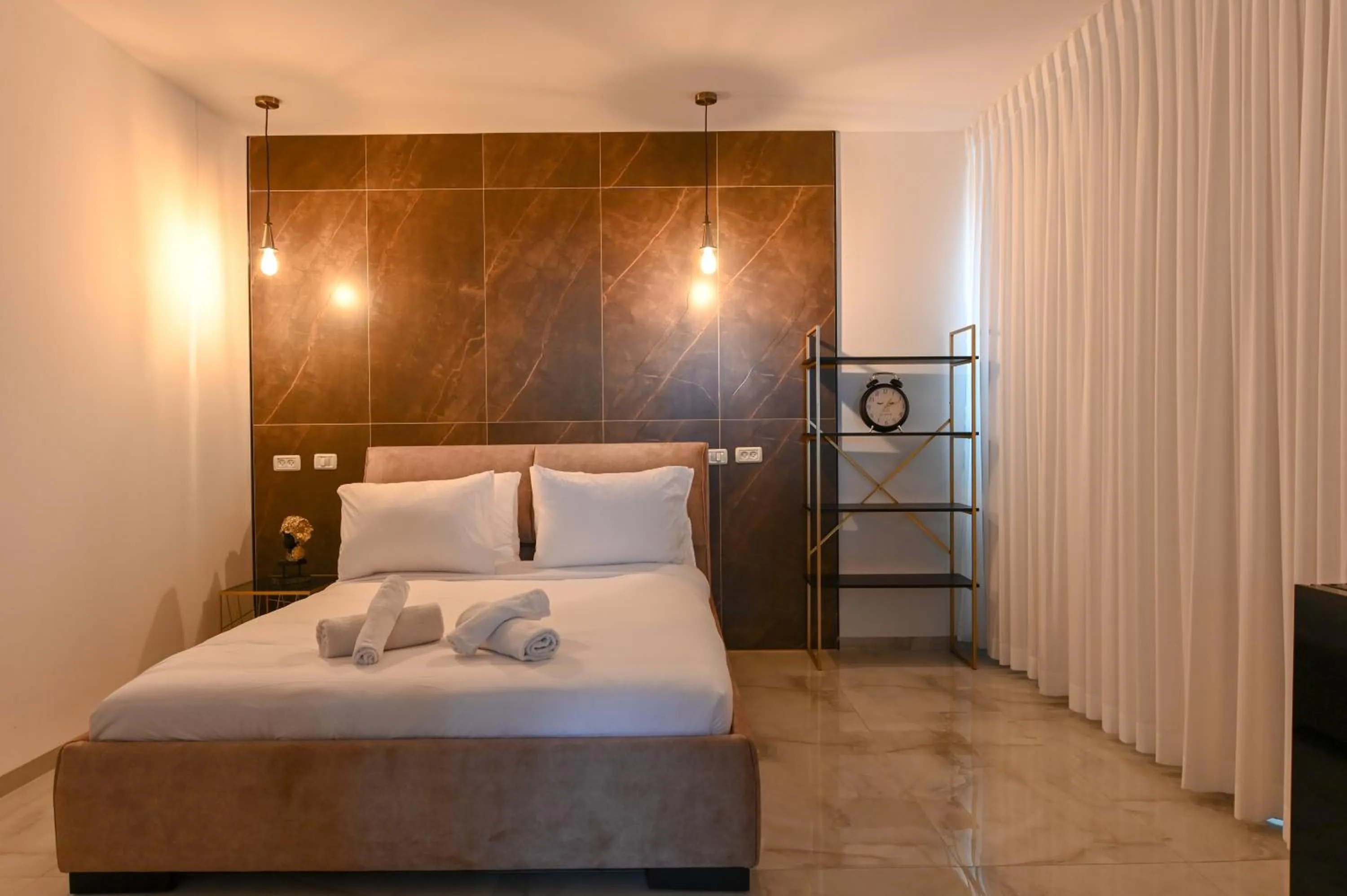 Bed in Lake Mansion Boutique Apartments