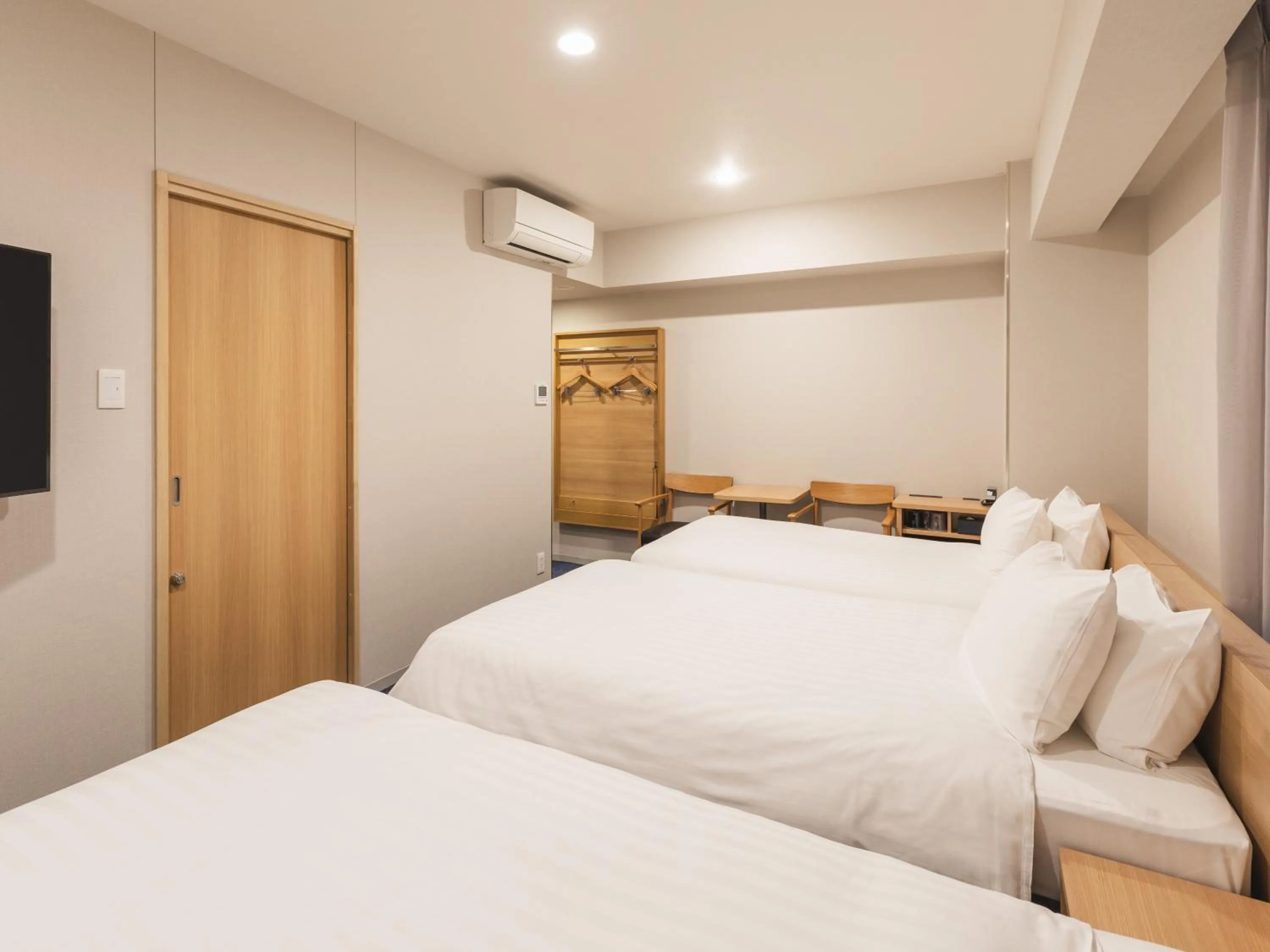 Bed in Sotetsu Fresa Inn Hiroshima