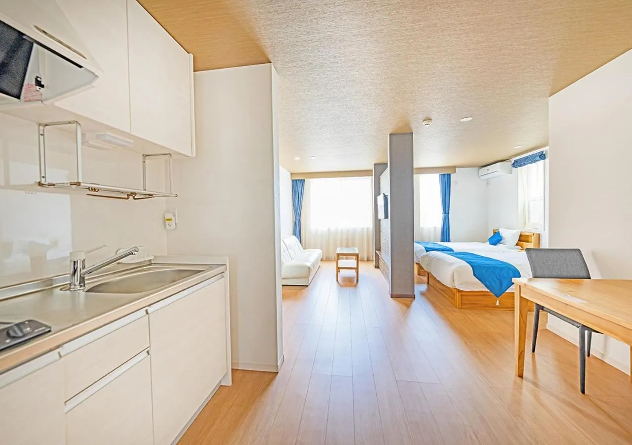 Bed in Hotel California Miyakojima Resort