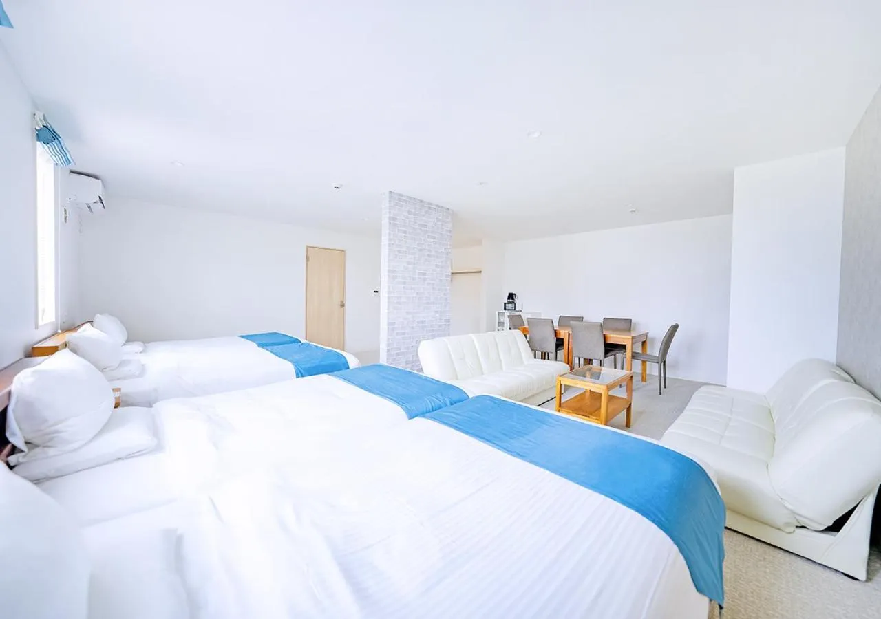 Bedroom, Bed in Hotel California Miyakojima Resort