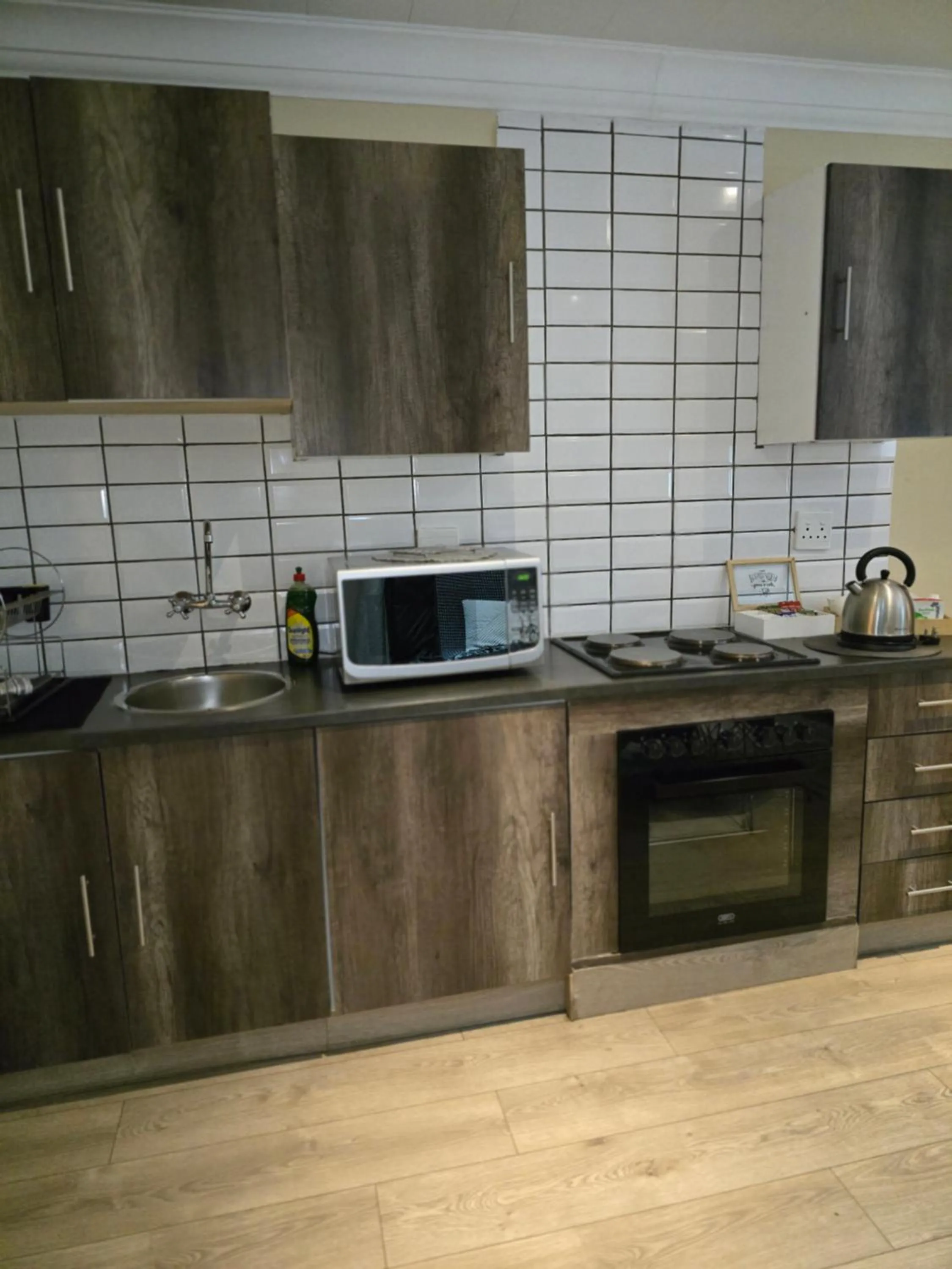 Kitchen or kitchenette in Halfway Gardens Home