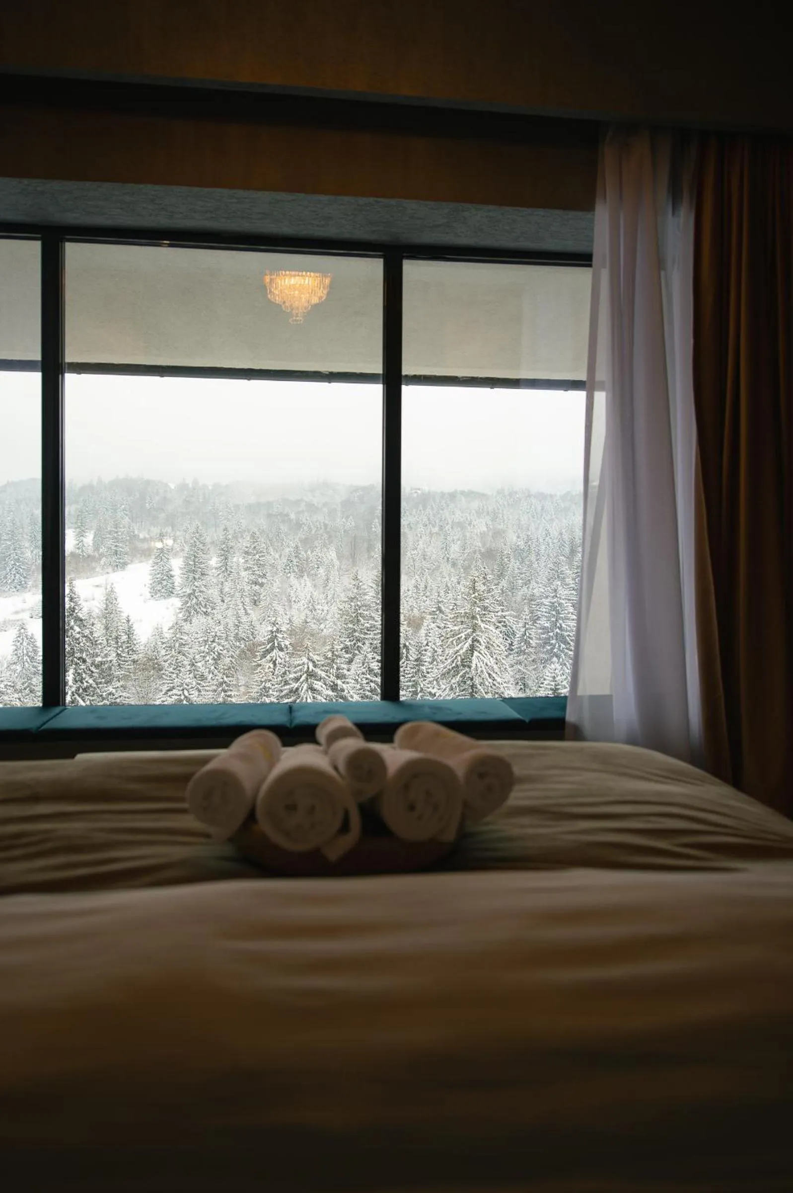 Bed in Elexus Apartments Poiana Brasov