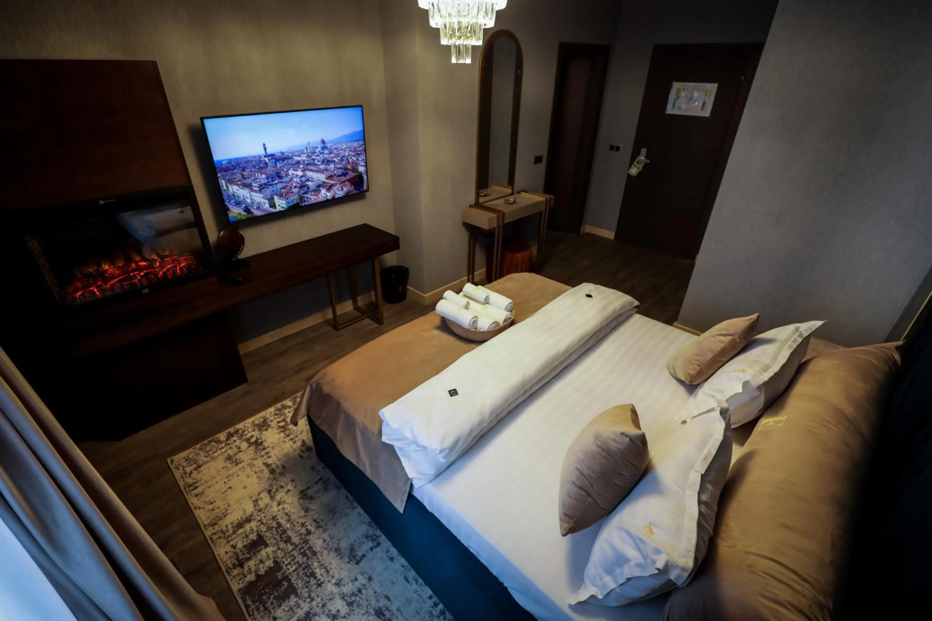 Bed in Elexus Apartments Poiana Brasov