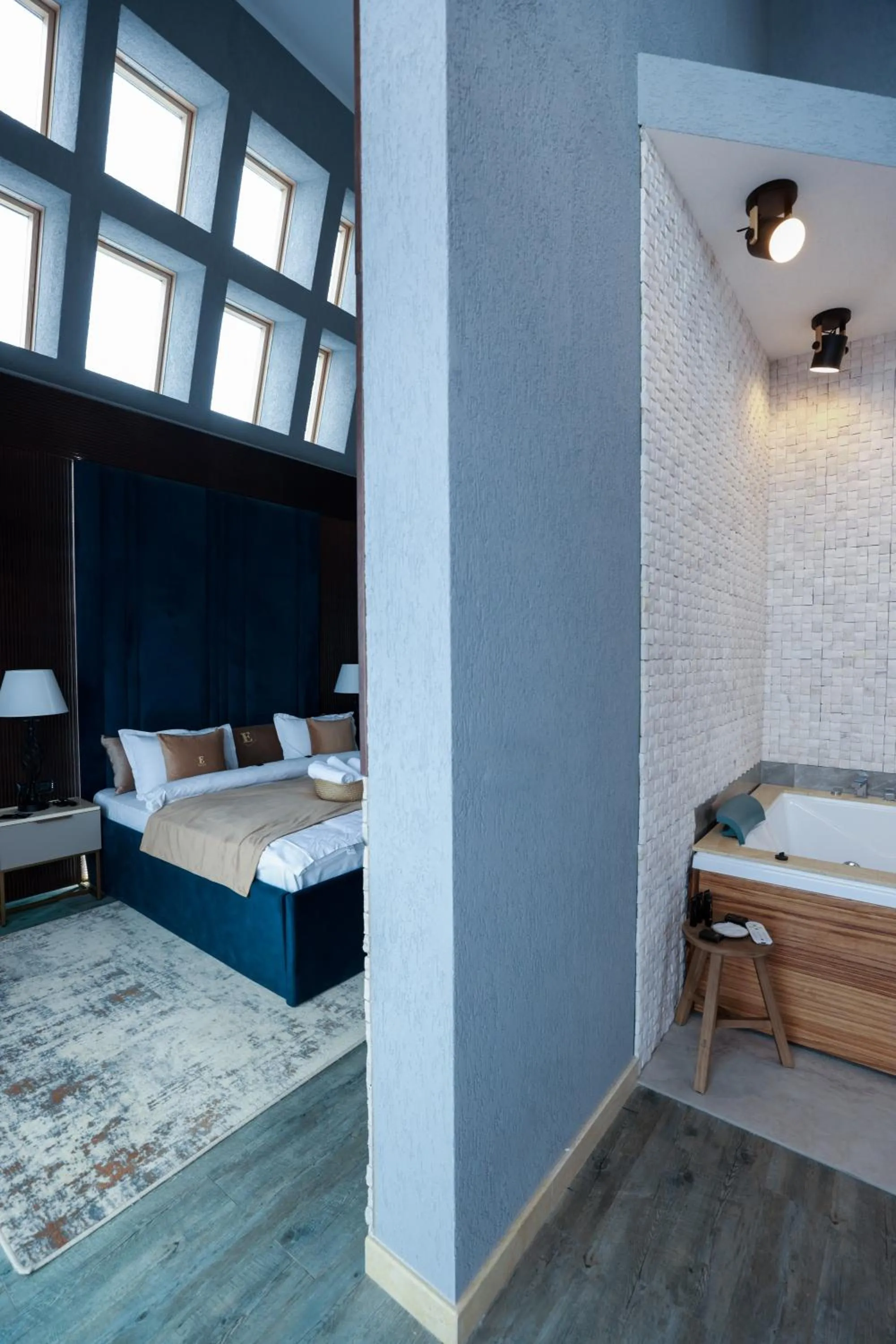 Bed in Elexus Apartments Poiana Brasov