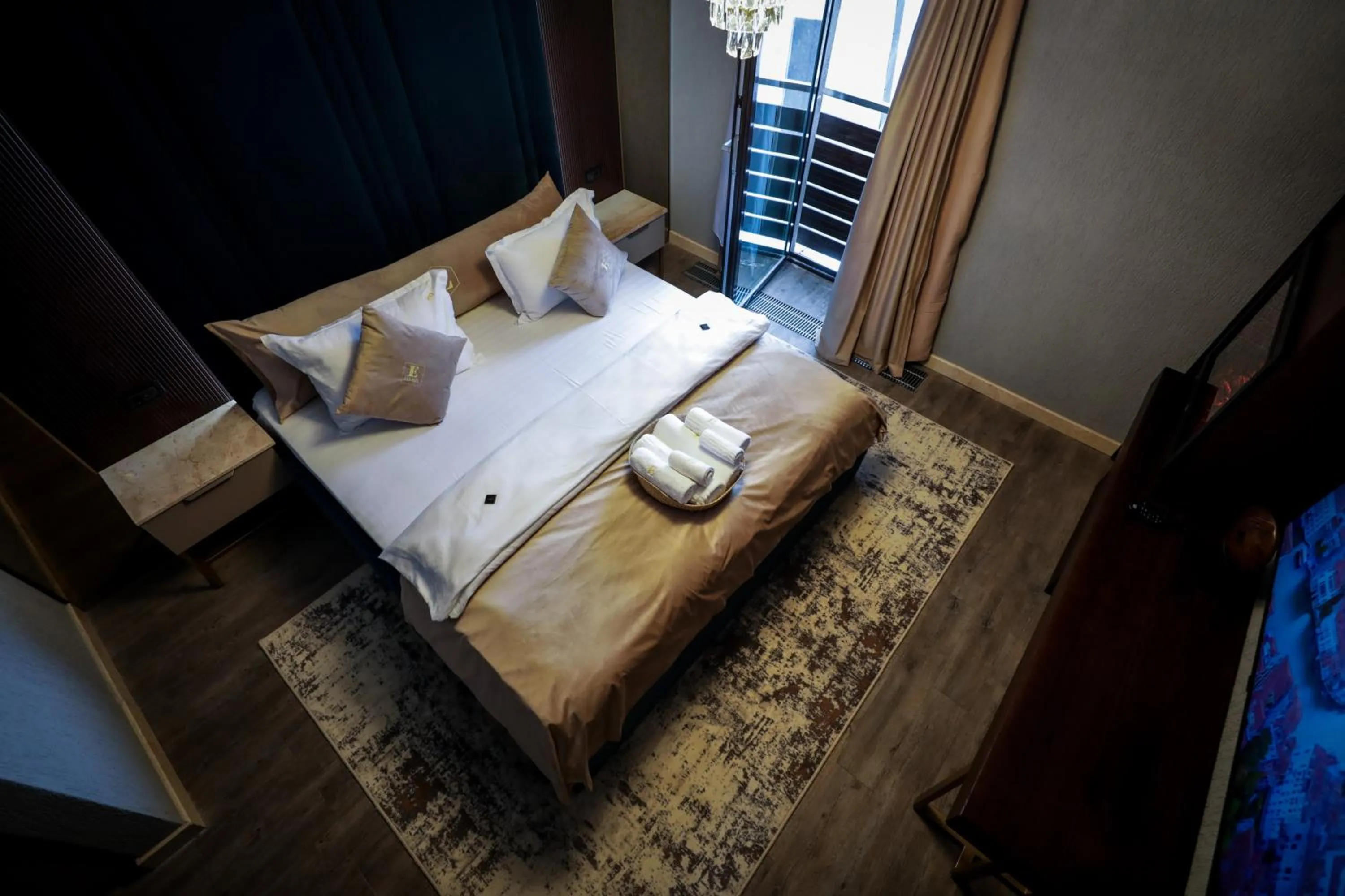 Bed in Elexus Apartments Poiana Brasov