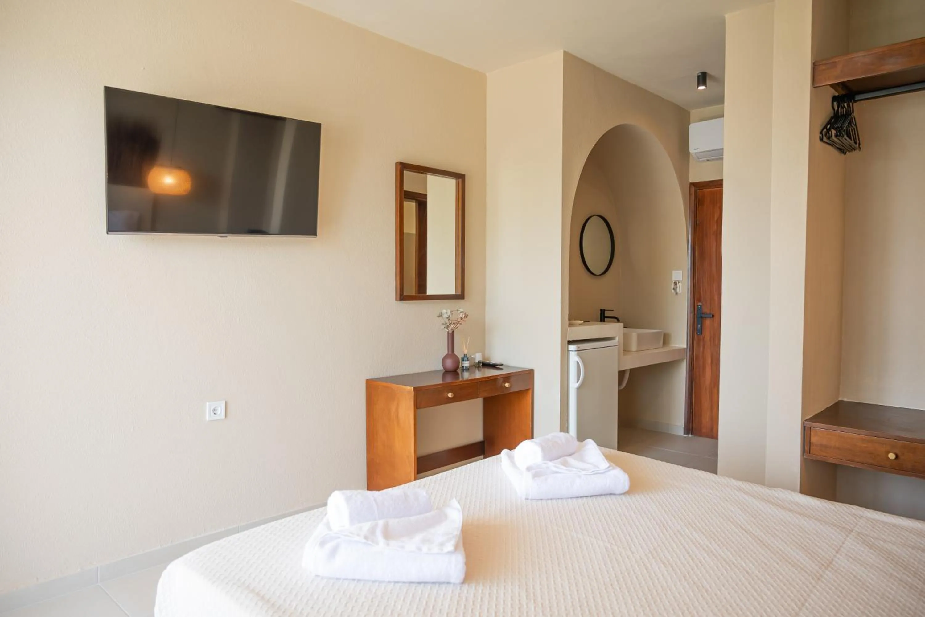 Bed in Atma Beach Rooms & Suites