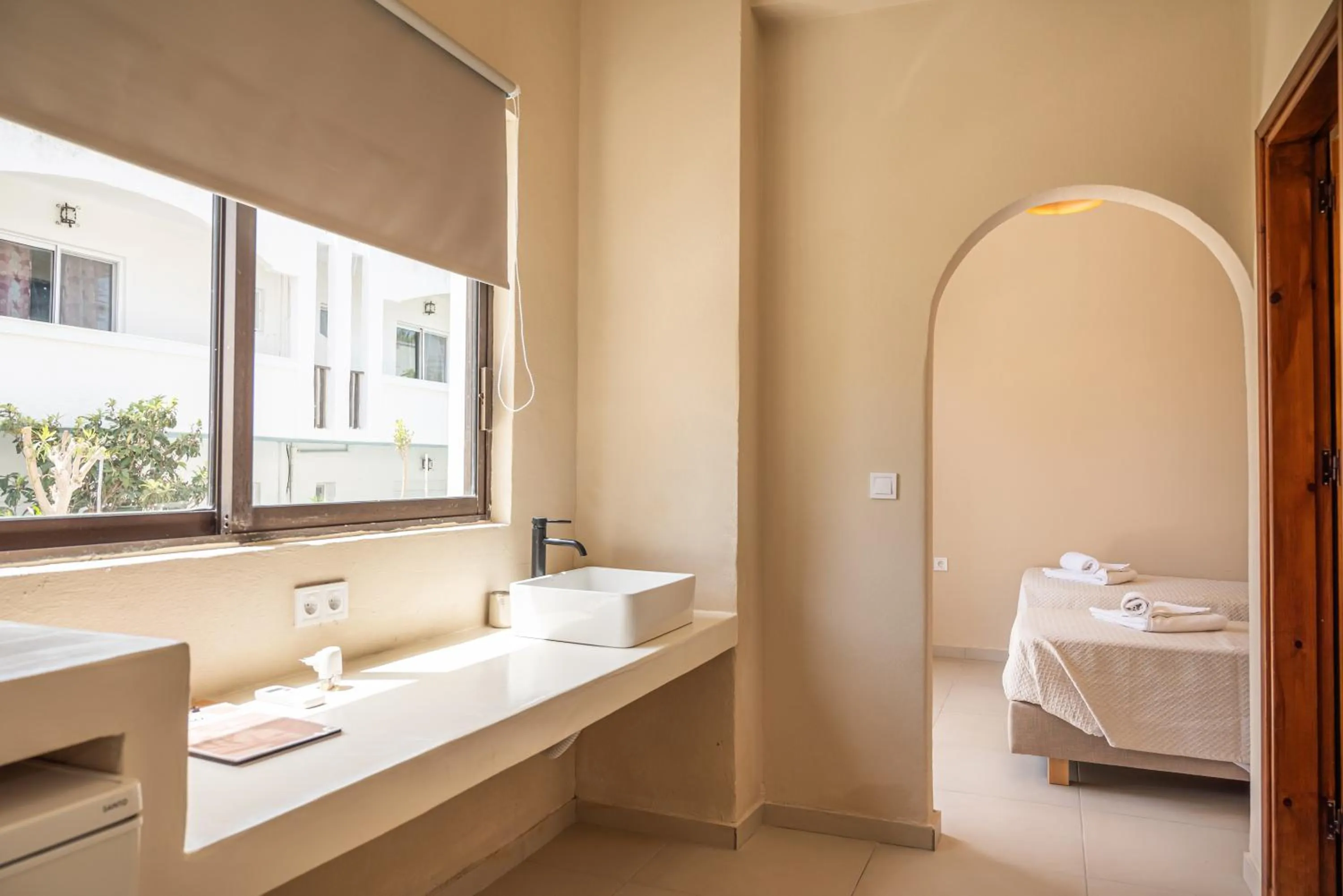 Bed in Atma Beach Rooms & Suites