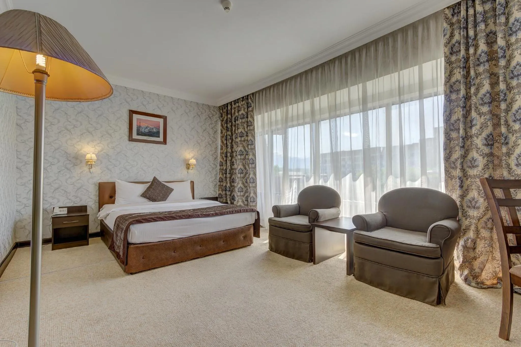 Living room, Bed in Premier Alatau Hotel