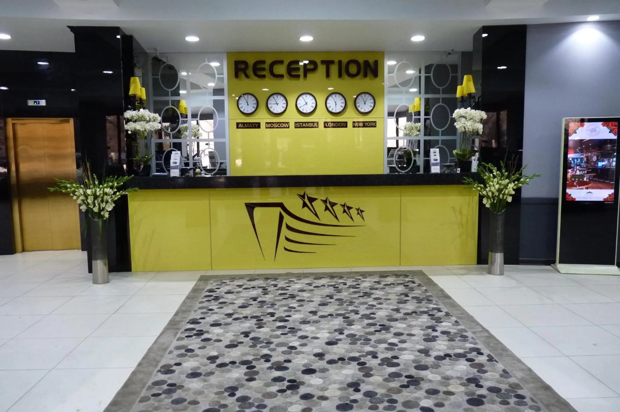 Lobby or reception in Premier Alatau Hotel