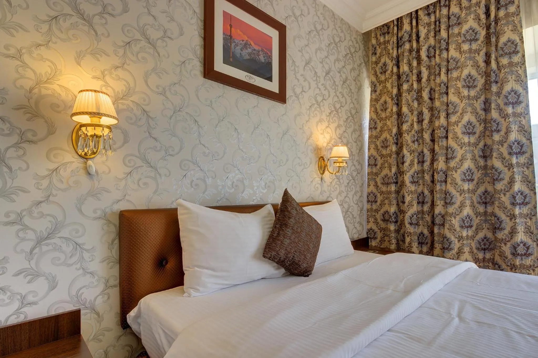 Decorative detail, Bed in Premier Alatau Hotel