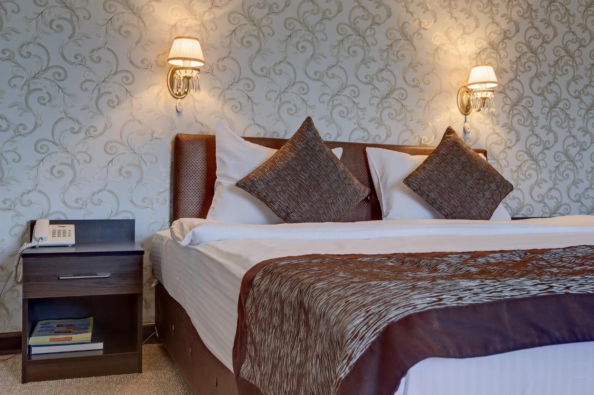 Bed in Premier Alatau Hotel