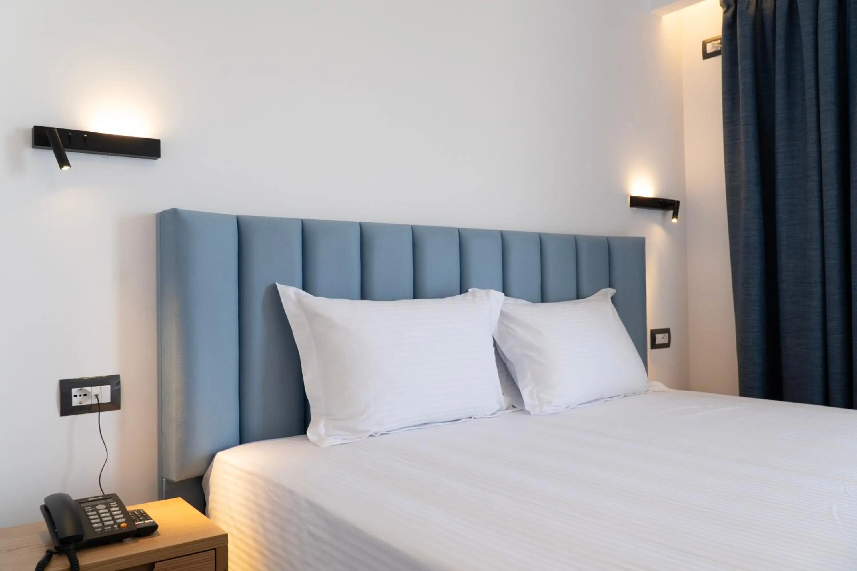 Bed in Hilltop Heaven Hotel