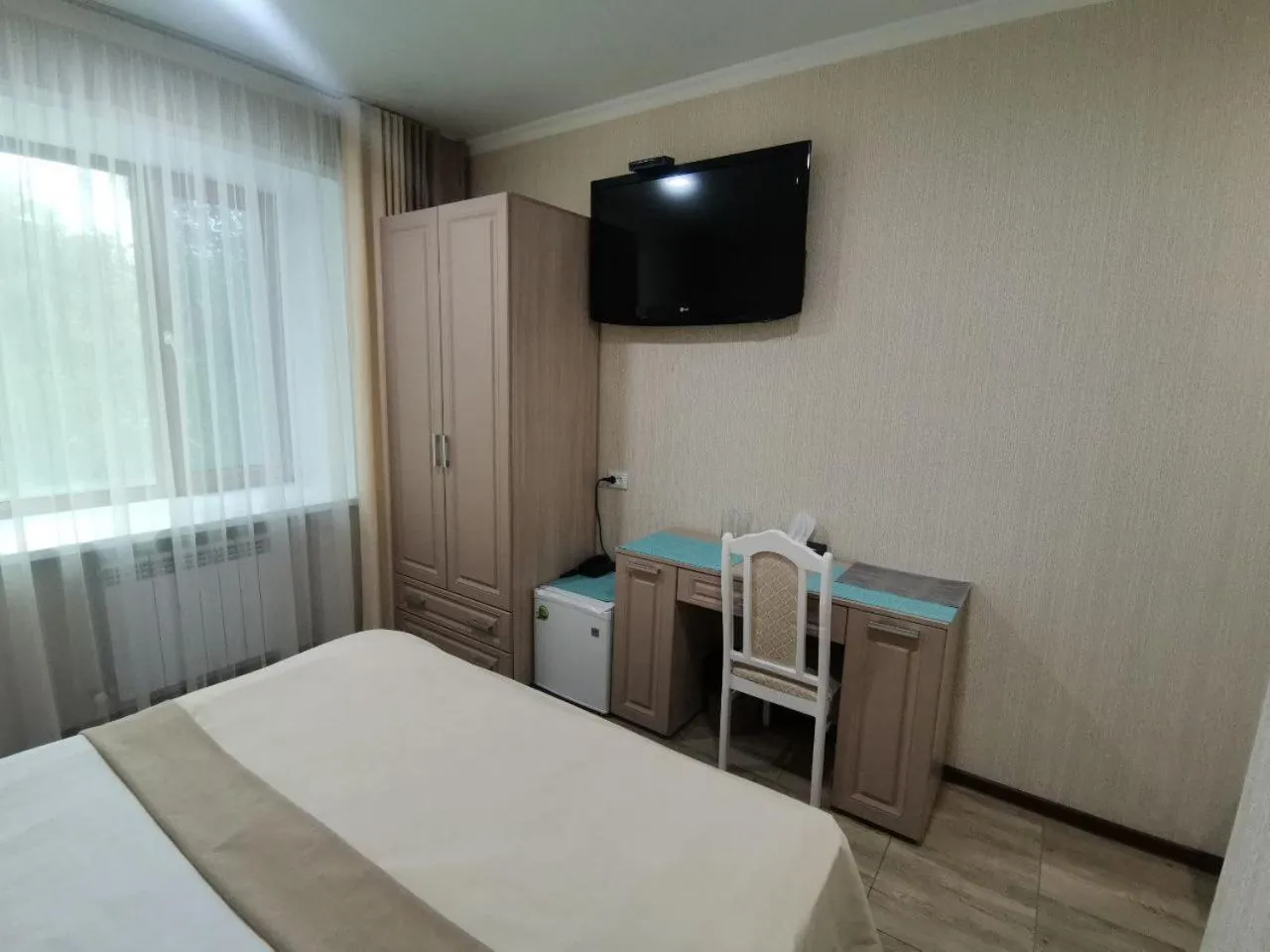 Bed in Altyn Adam Hotel