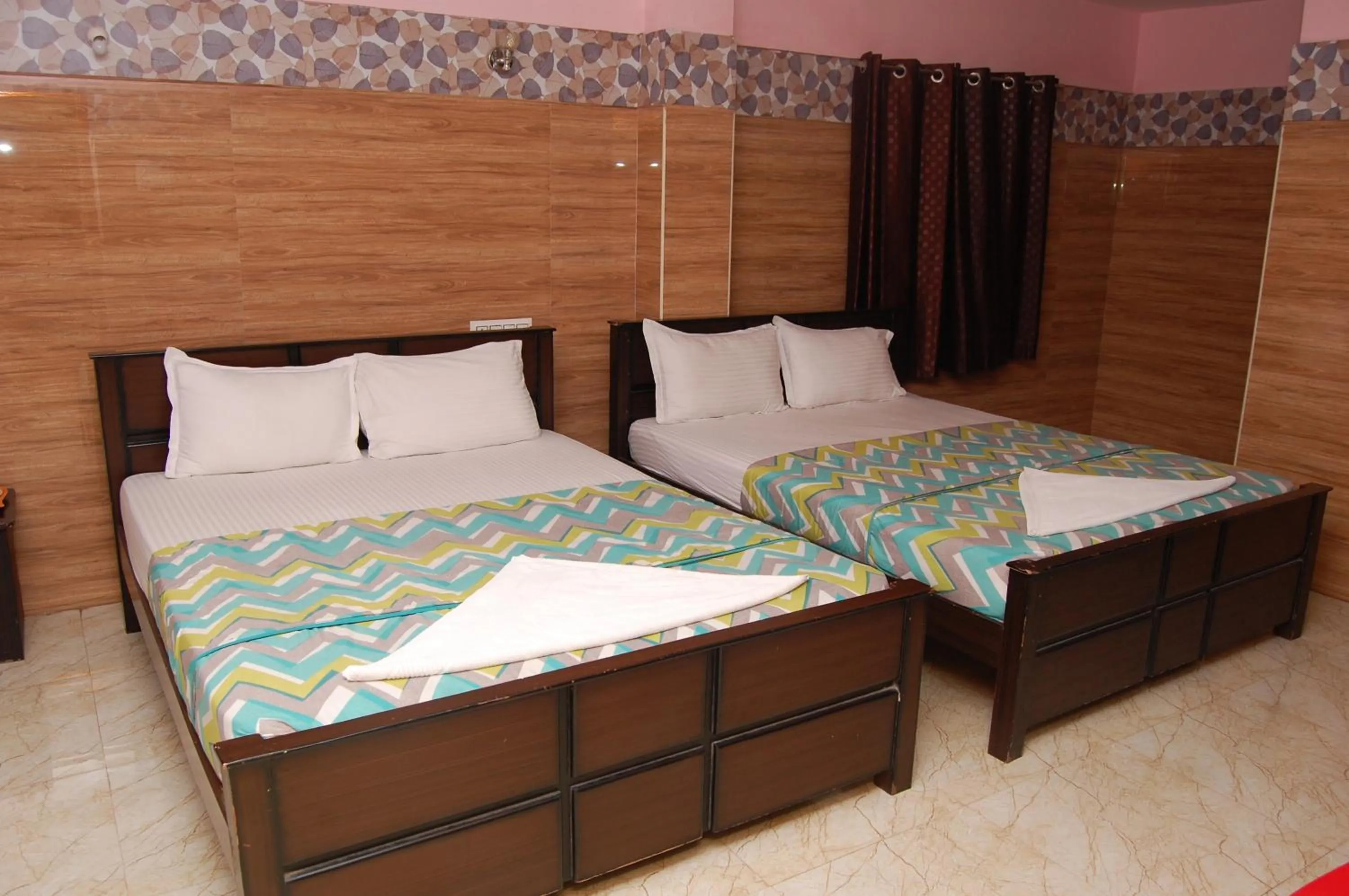 Photo of the whole room, Bed in Adhi Residency