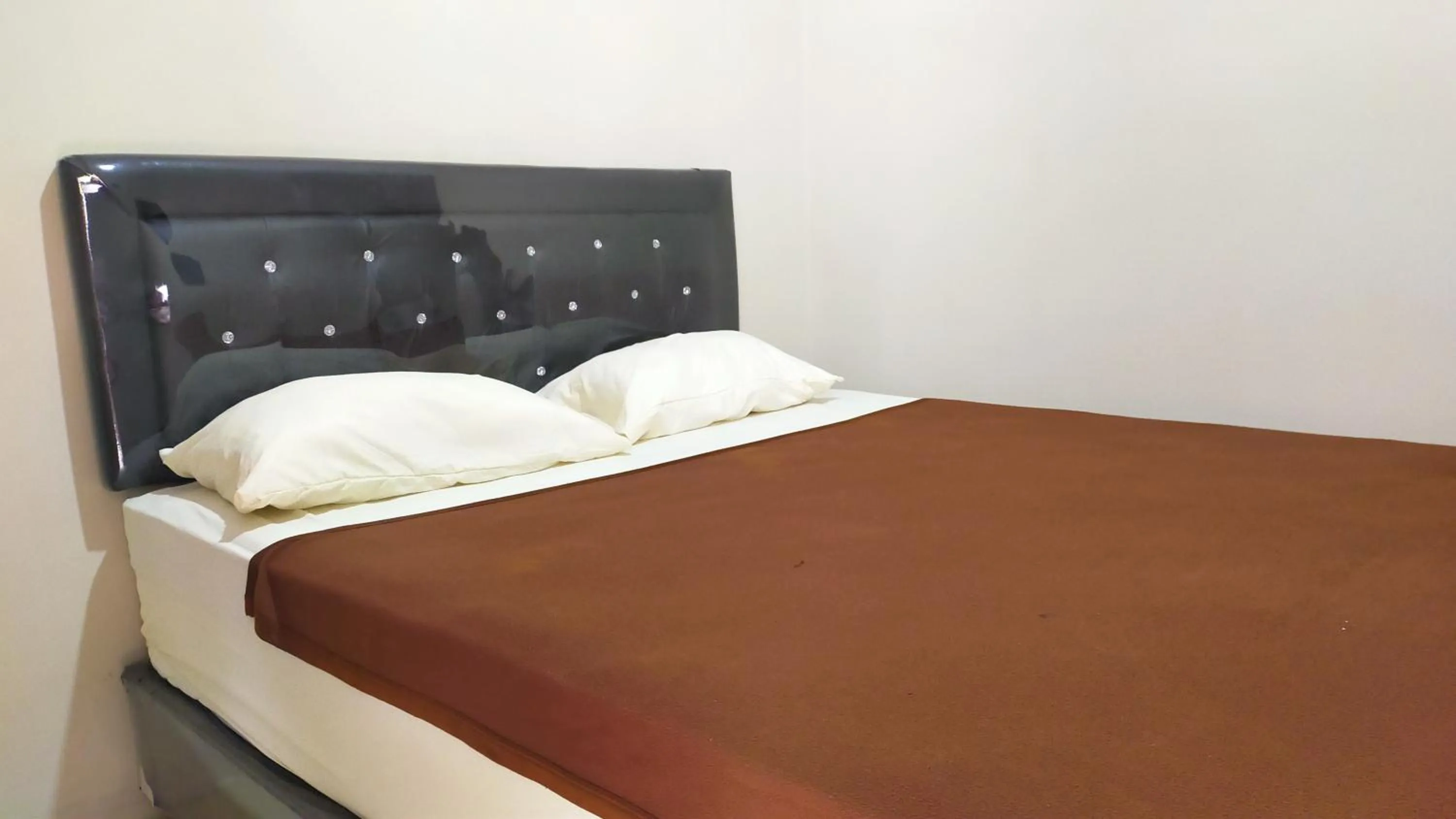 People, Bed in Aqsa Guest House Ciamis Syariah