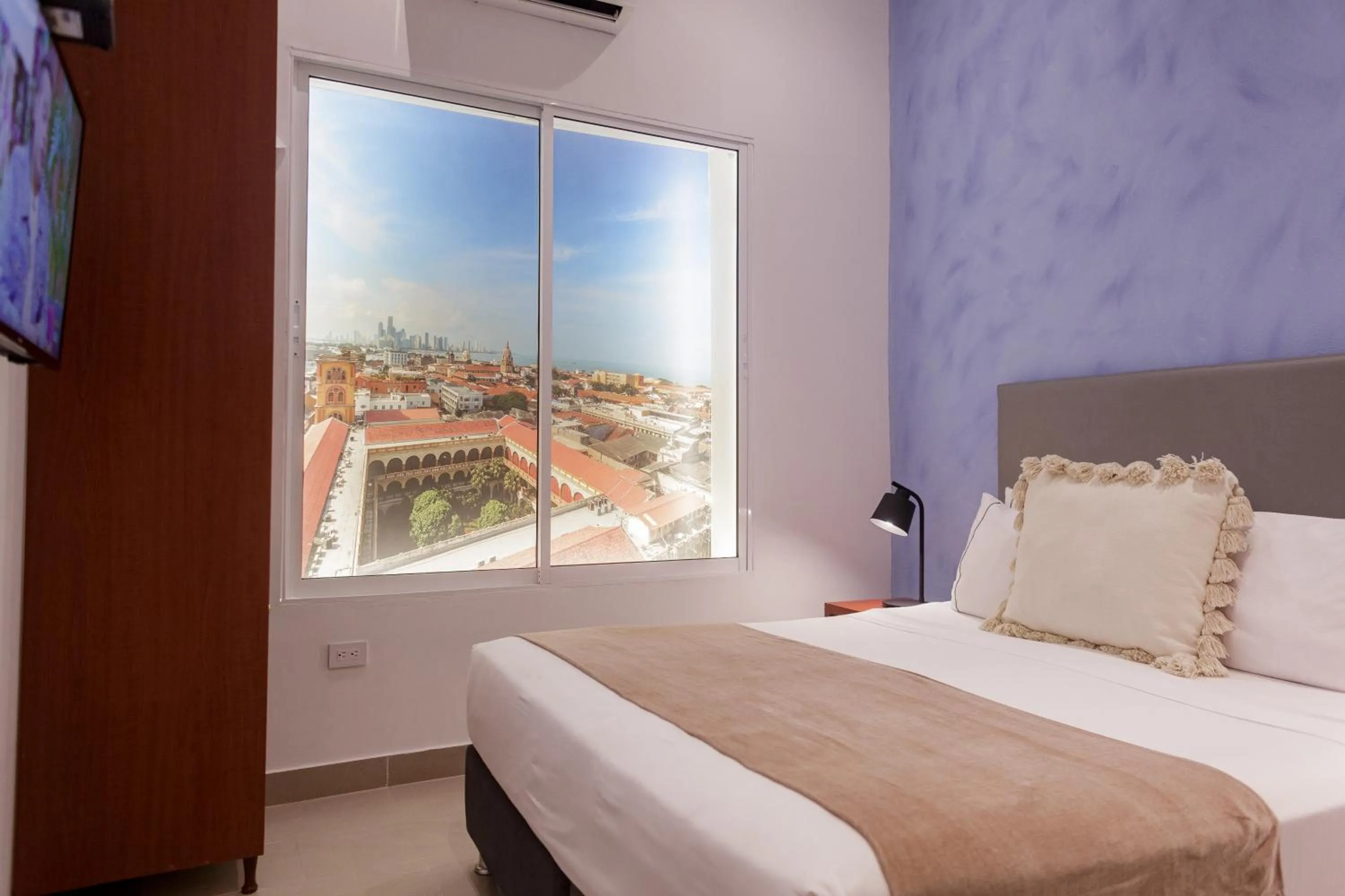 TV and multimedia, Bed in Ganem Suites Cartagena