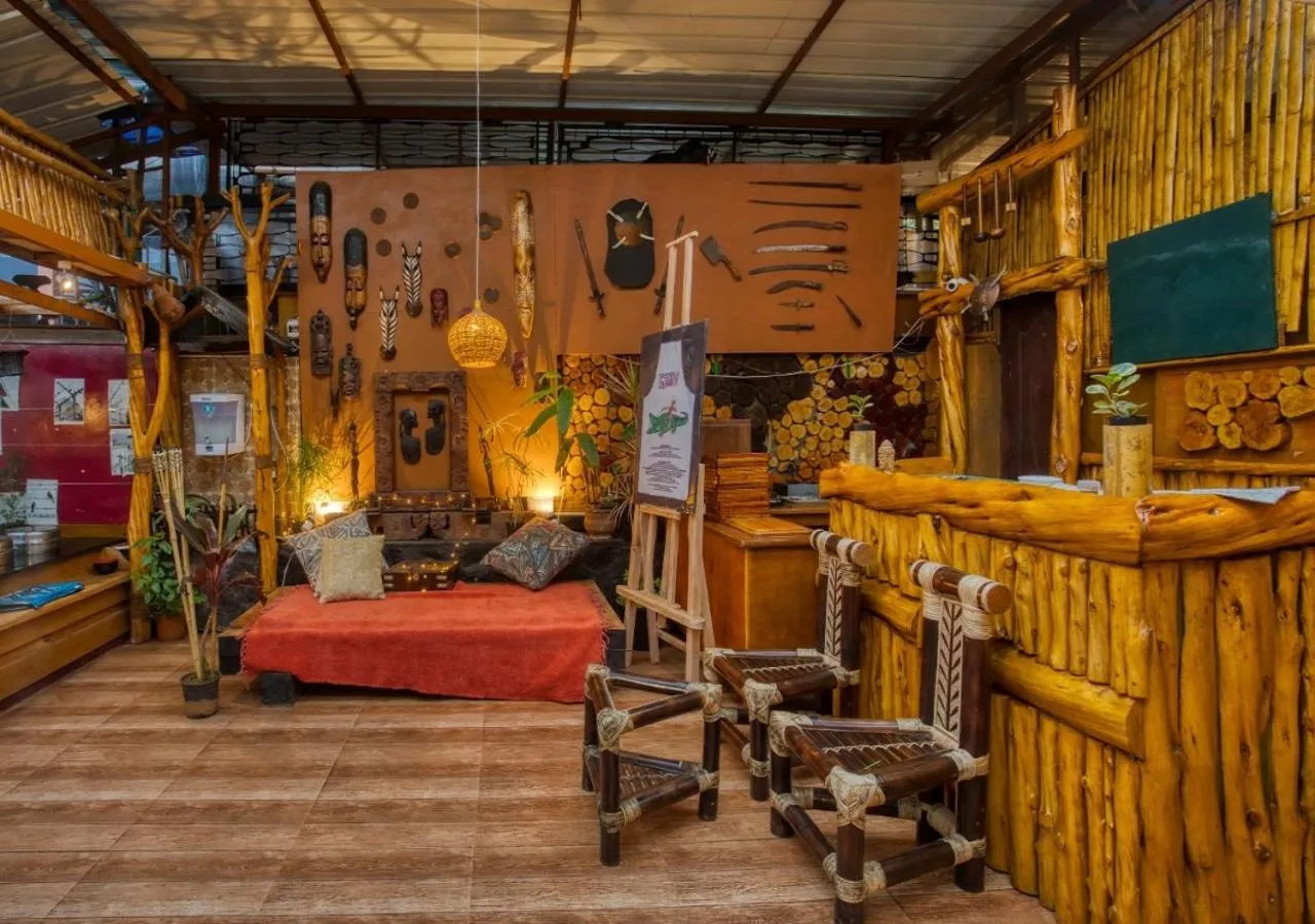 Seating area, Bed in De Rock Jungle Living Resort