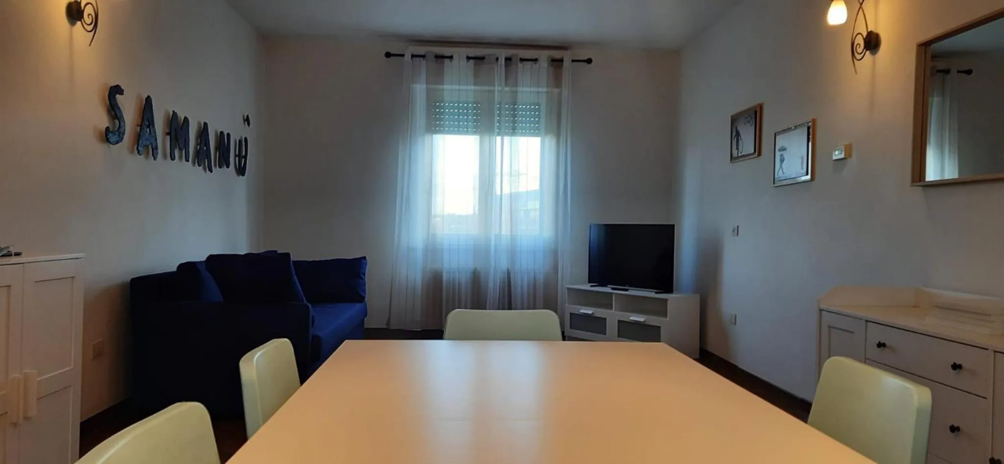 Communal lounge/ TV room in B&B la Casa Giusotto