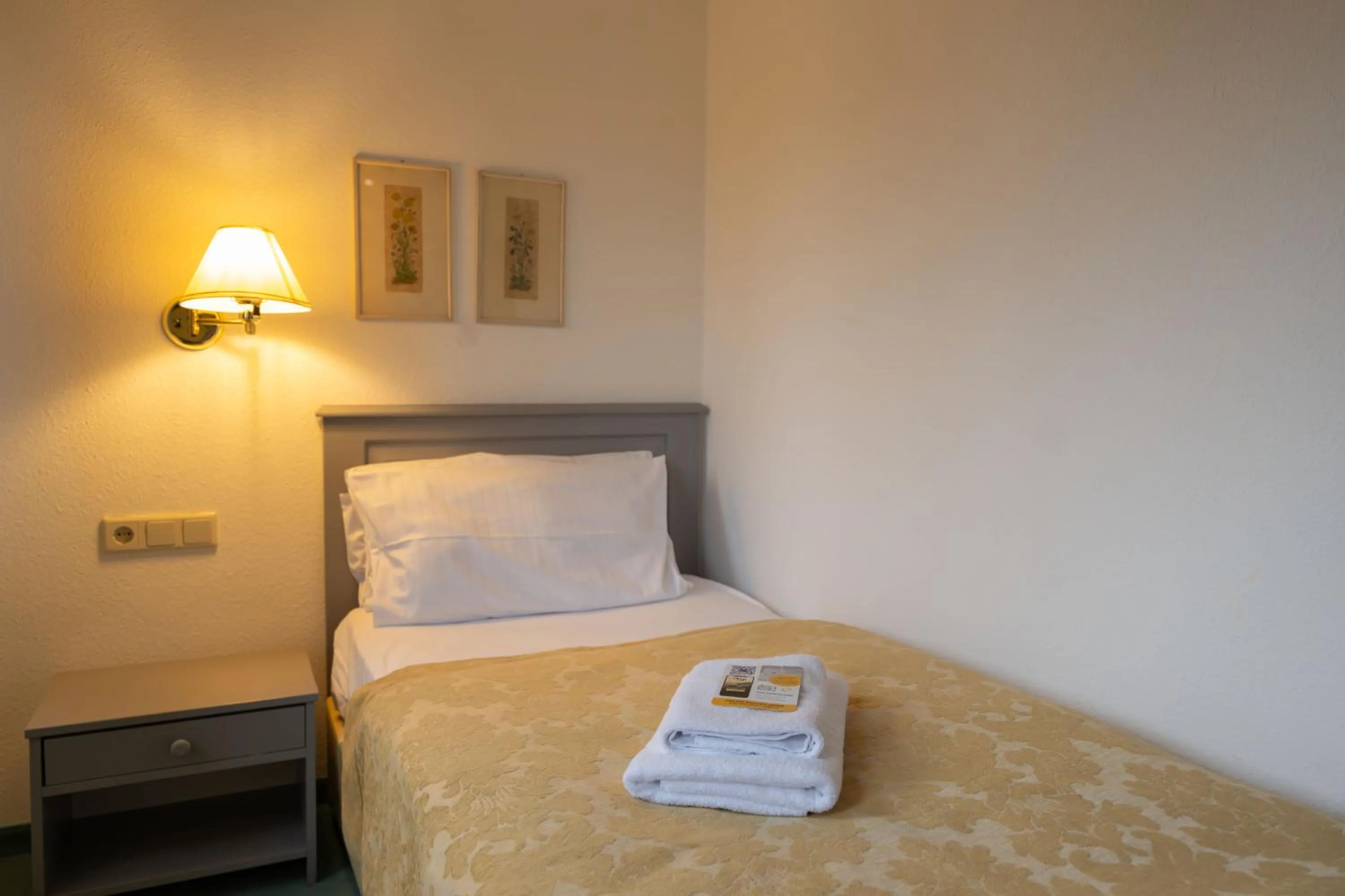 Photo of the whole room, Bed in Parkhotel Hohnstein by STEIGER Hotels