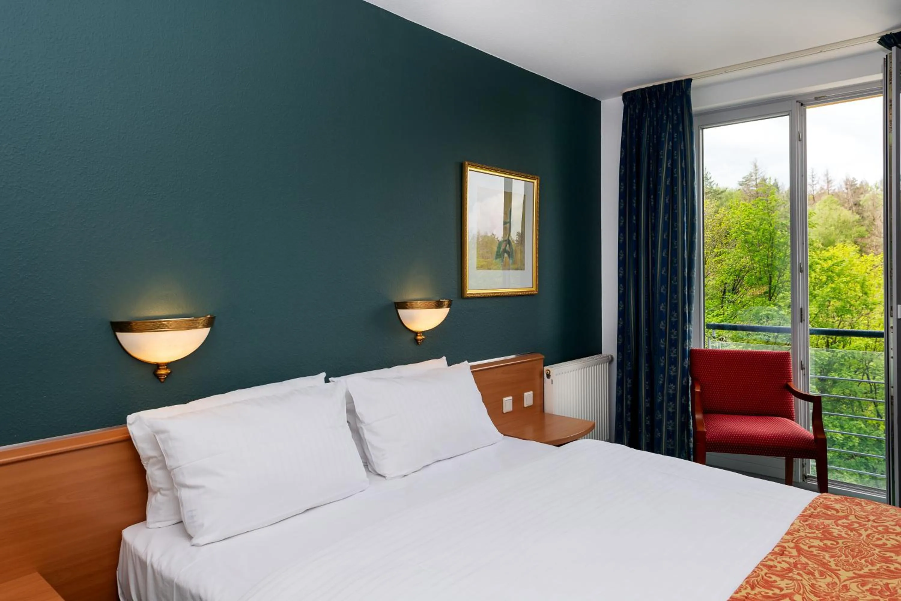 Photo of the whole room, Bed in Parkhotel Hohnstein by STEIGER Hotels