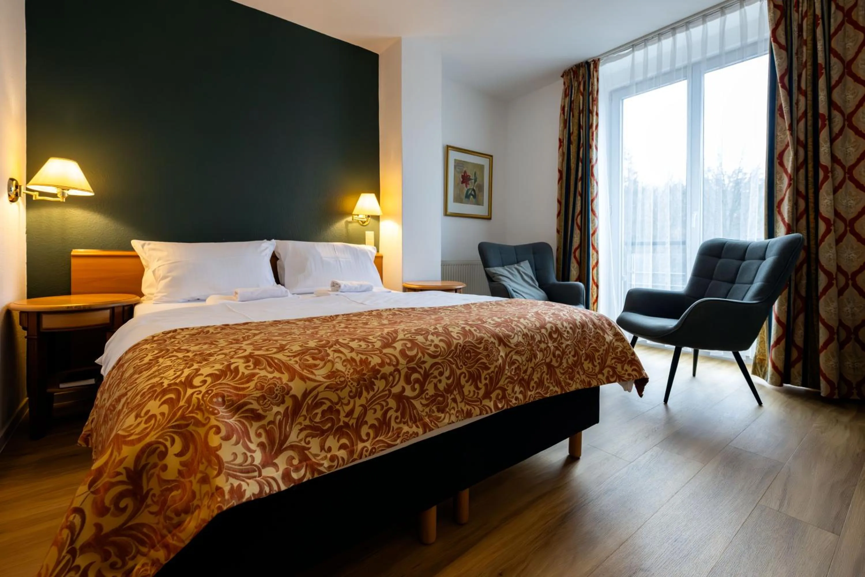 Photo of the whole room, Bed in Parkhotel Hohnstein by STEIGER Hotels