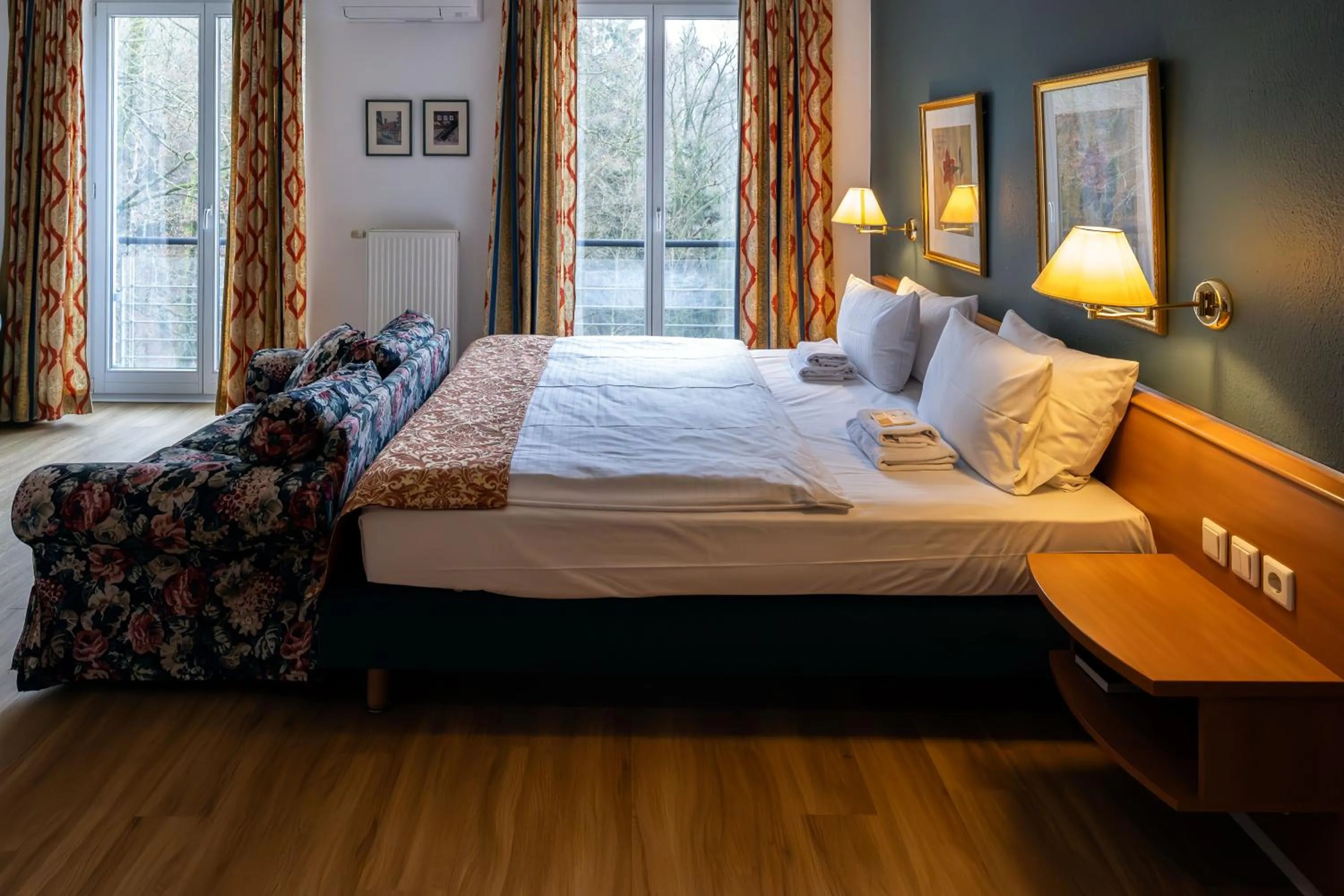 Photo of the whole room, Bed in Parkhotel Hohnstein by STEIGER Hotels