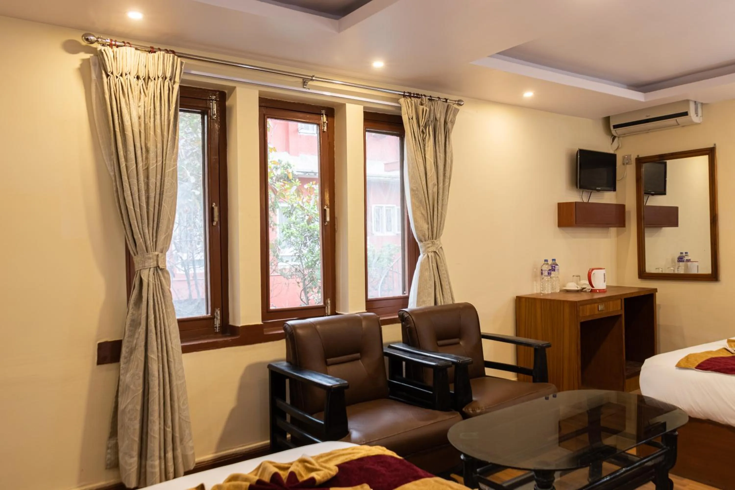 Seating area, Bed in Everland Kathmandu Hotel