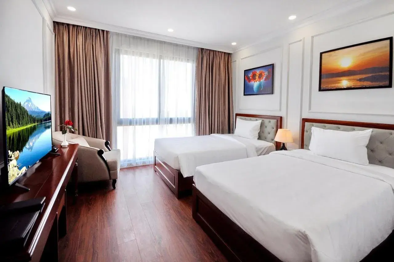 Deluxe Double or Twin Room with City View in Sunflower Hotel Phú Yên Deluxe Double or Twin Room with City View in Sunflower Hotel Phú Yên