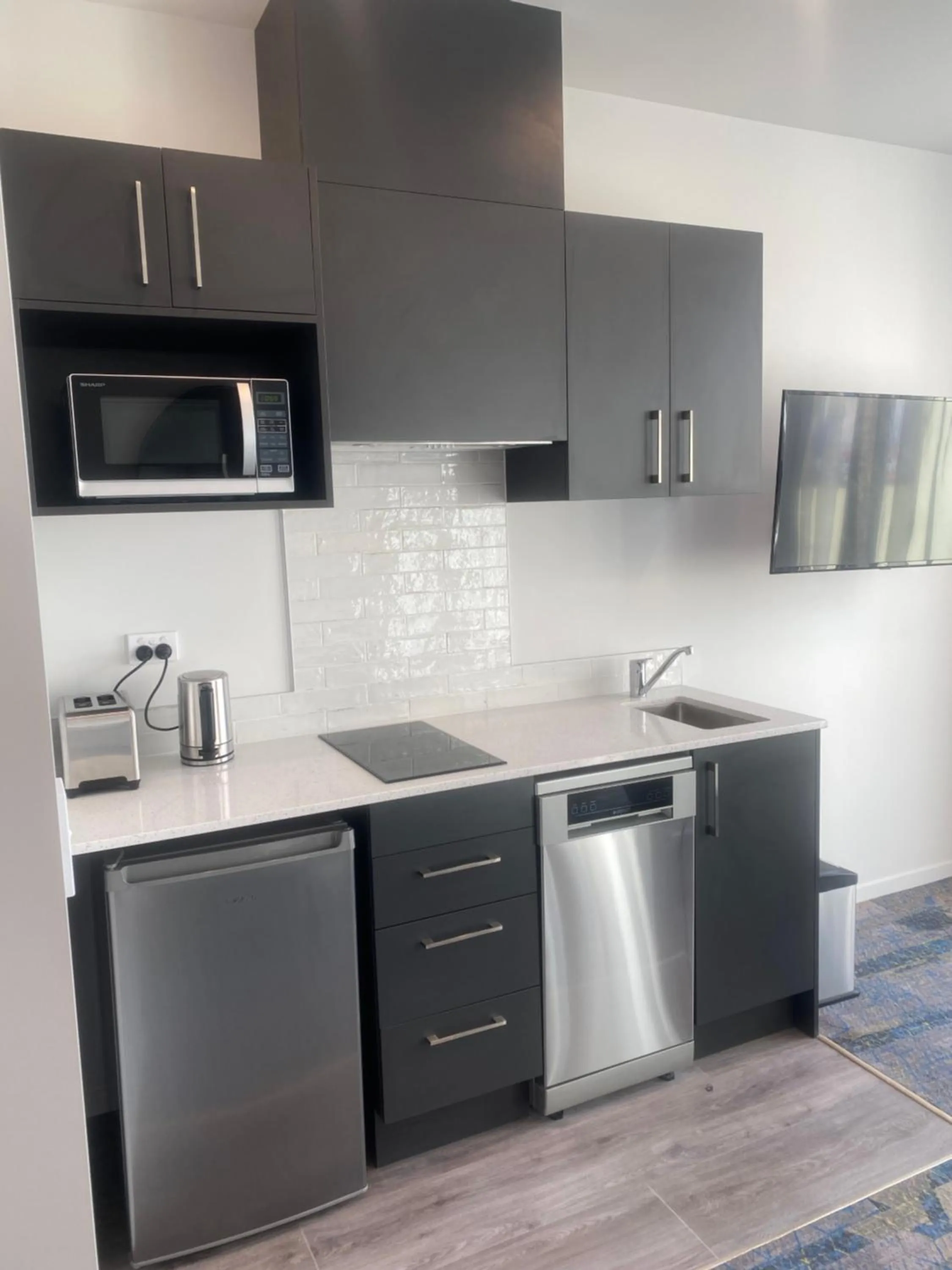 Kitchen or kitchenette in Ramada by Wyndham Wellington Taranaki Street