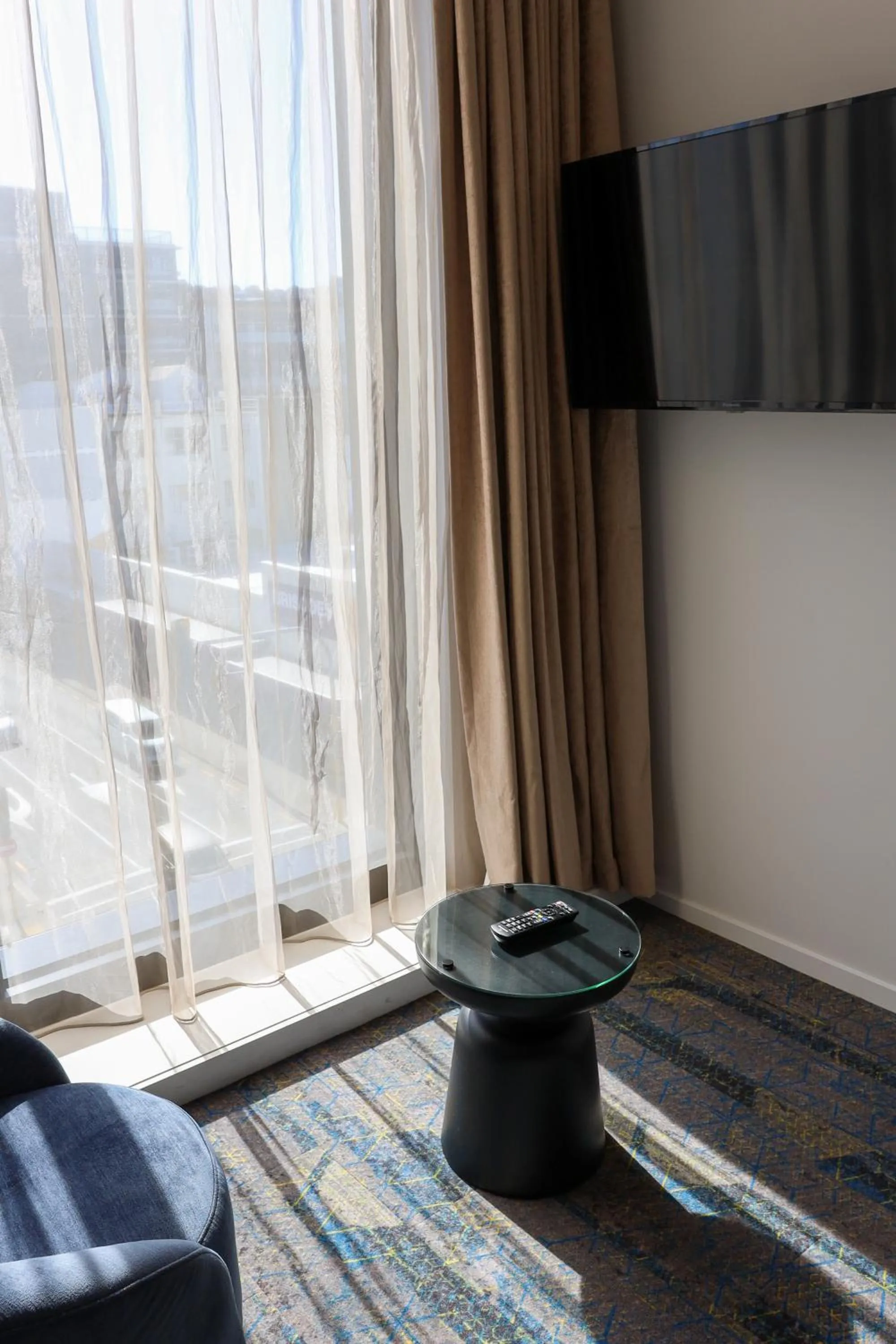 Seating area in Ramada by Wyndham Wellington Taranaki Street