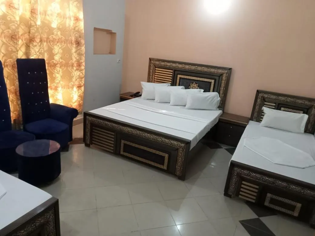 Bed in Hotel Royal Luxury Multan