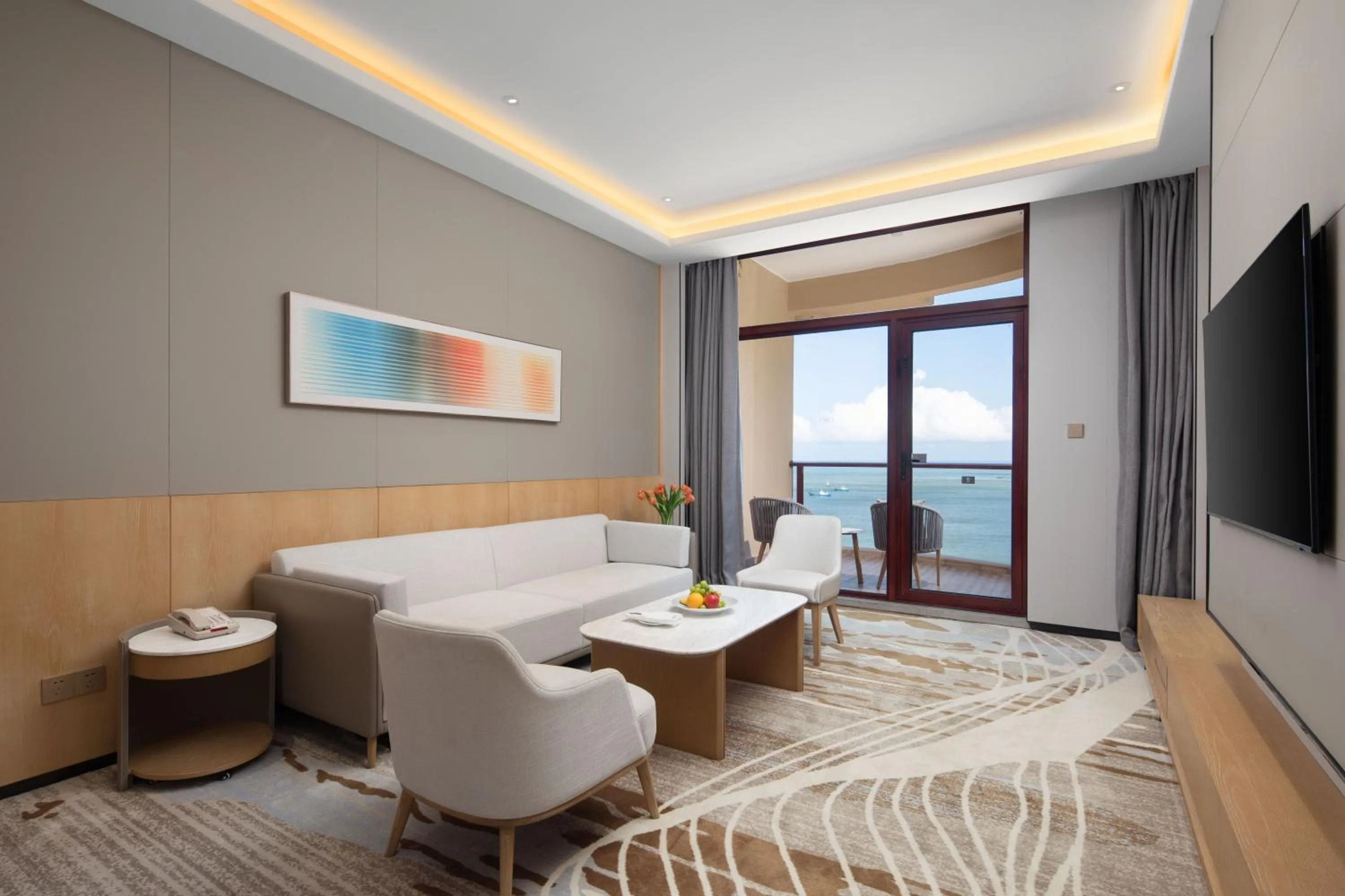 Living room in Crowne Plaza Zhoushan Seaview by IHG