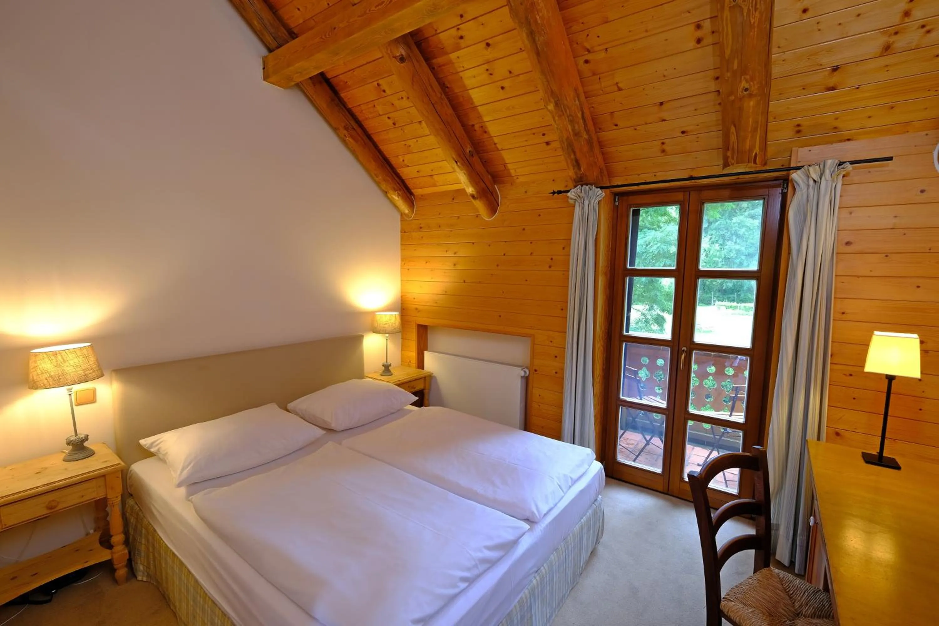 Photo of the whole room, Bed in Hotel Gut Klostermühle natur resort & medical spa